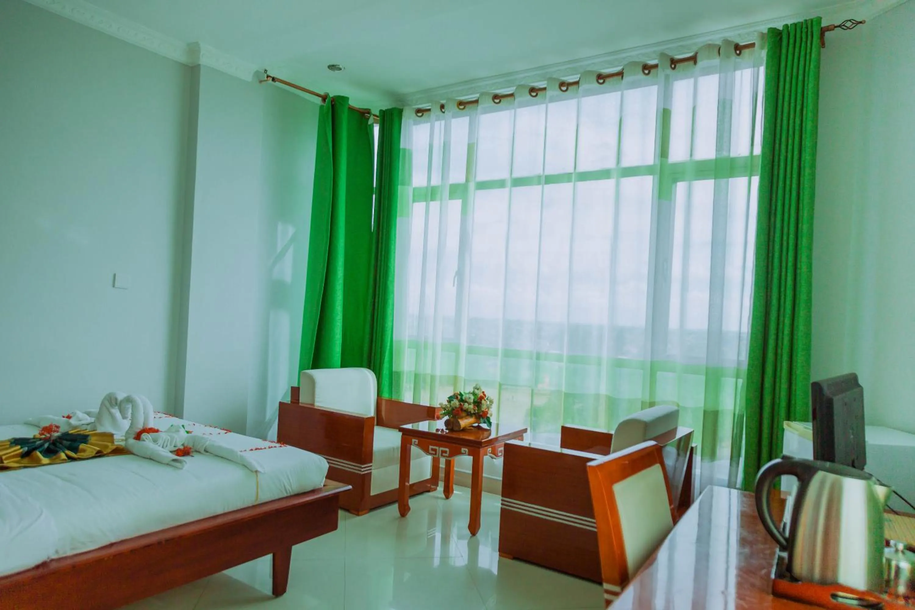 Bed in Greenlight Hotel