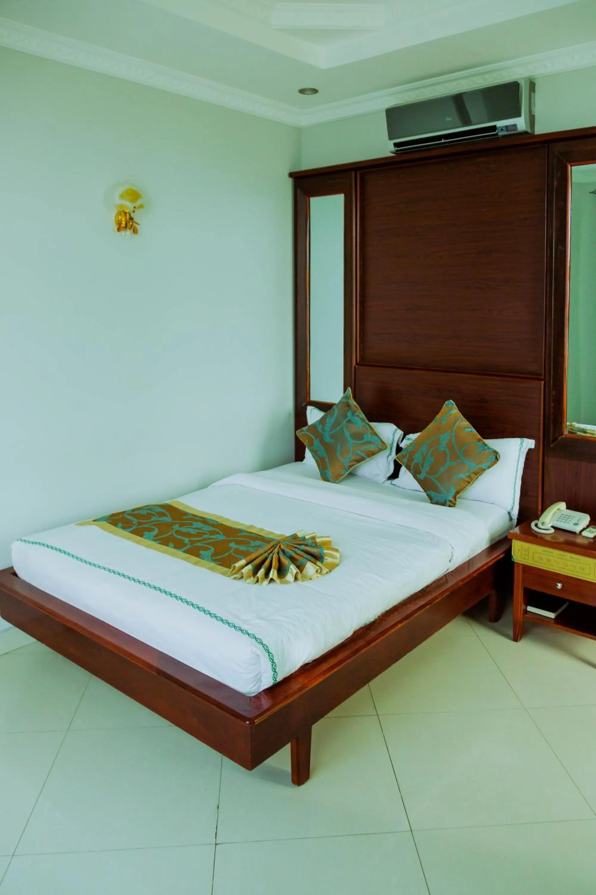 Bed in Greenlight Hotel