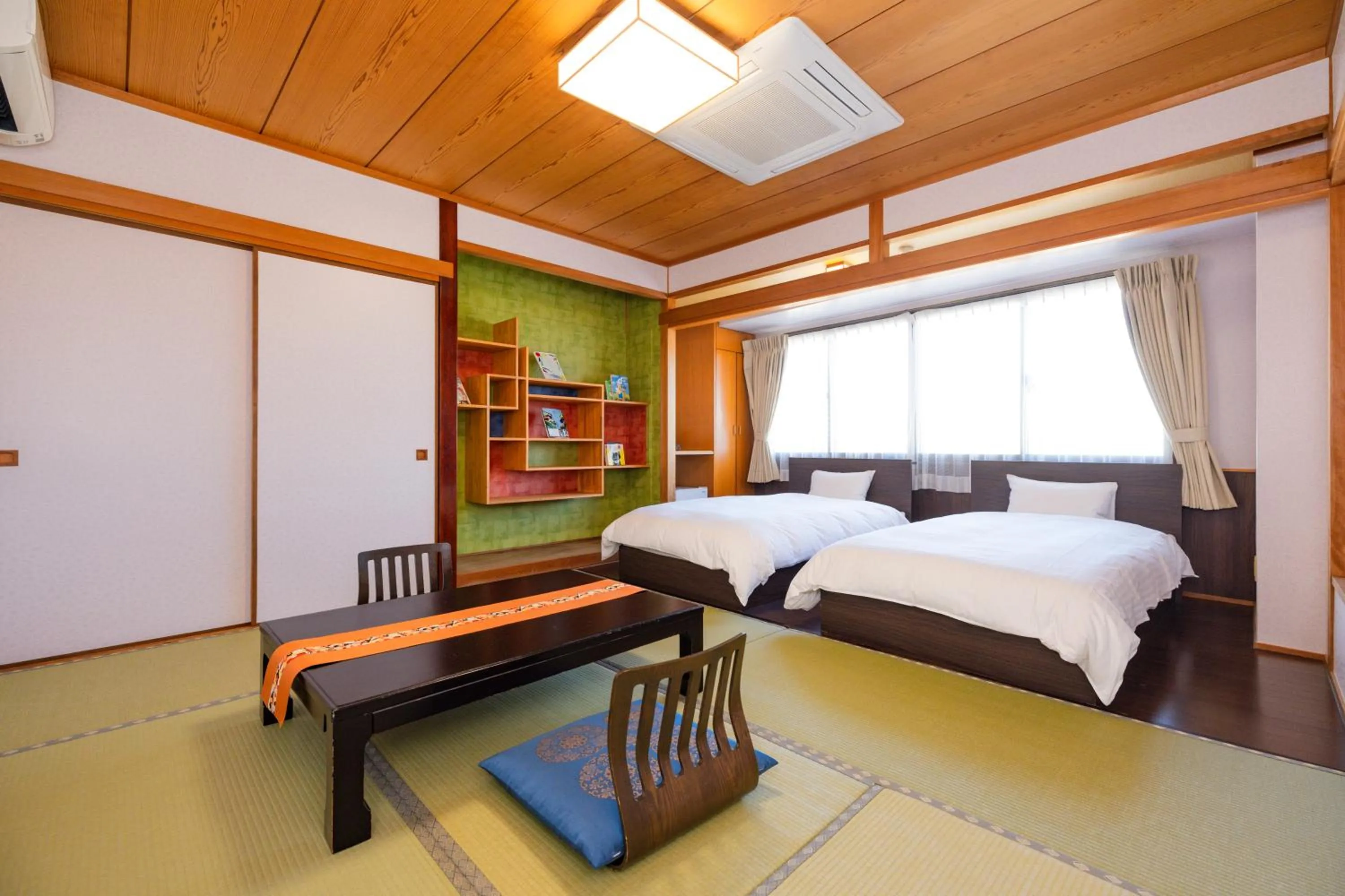 Bed in Hotel Takasago