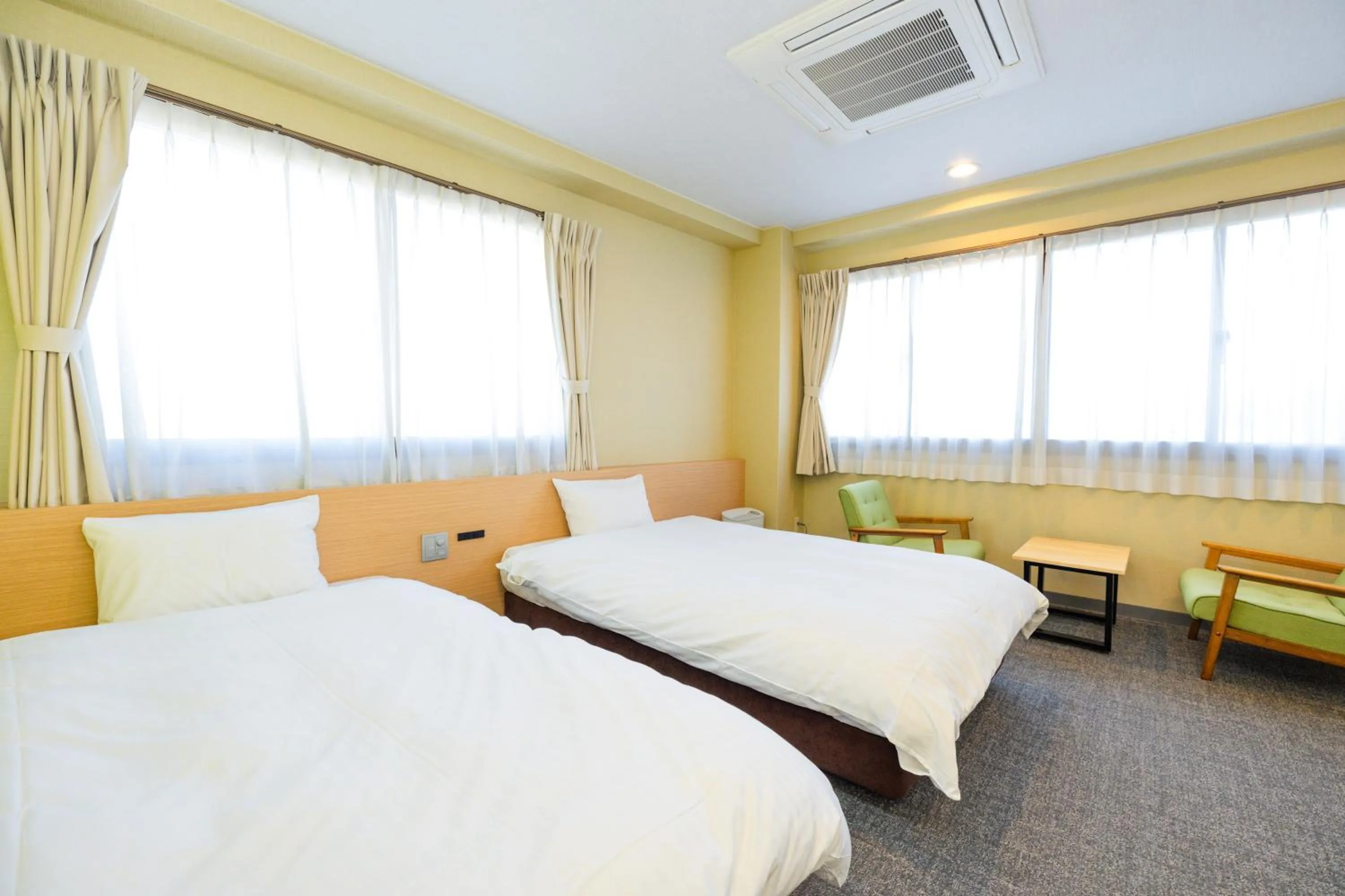 Bed in Hotel Takasago