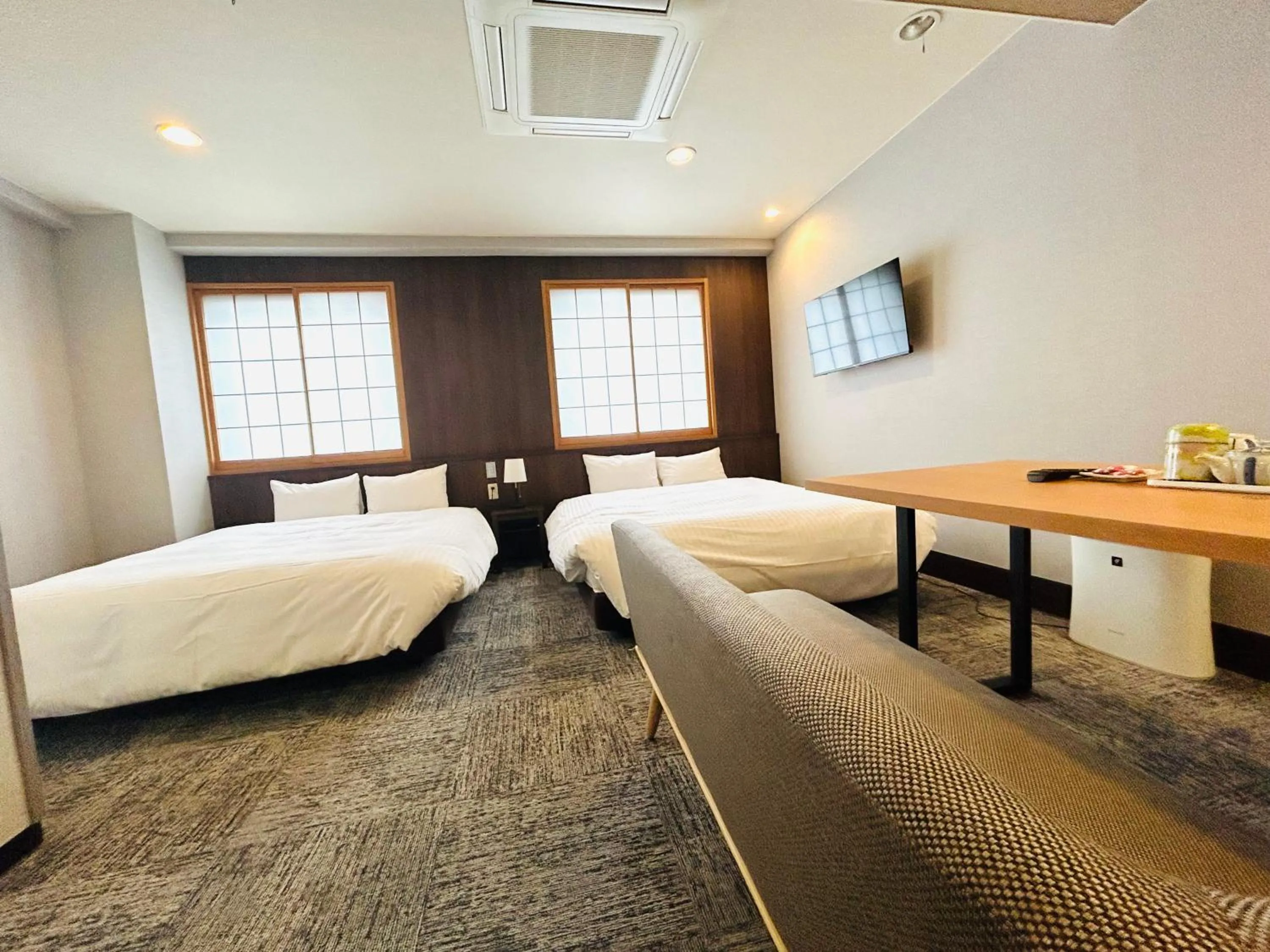 Bed in Hotel Takasago
