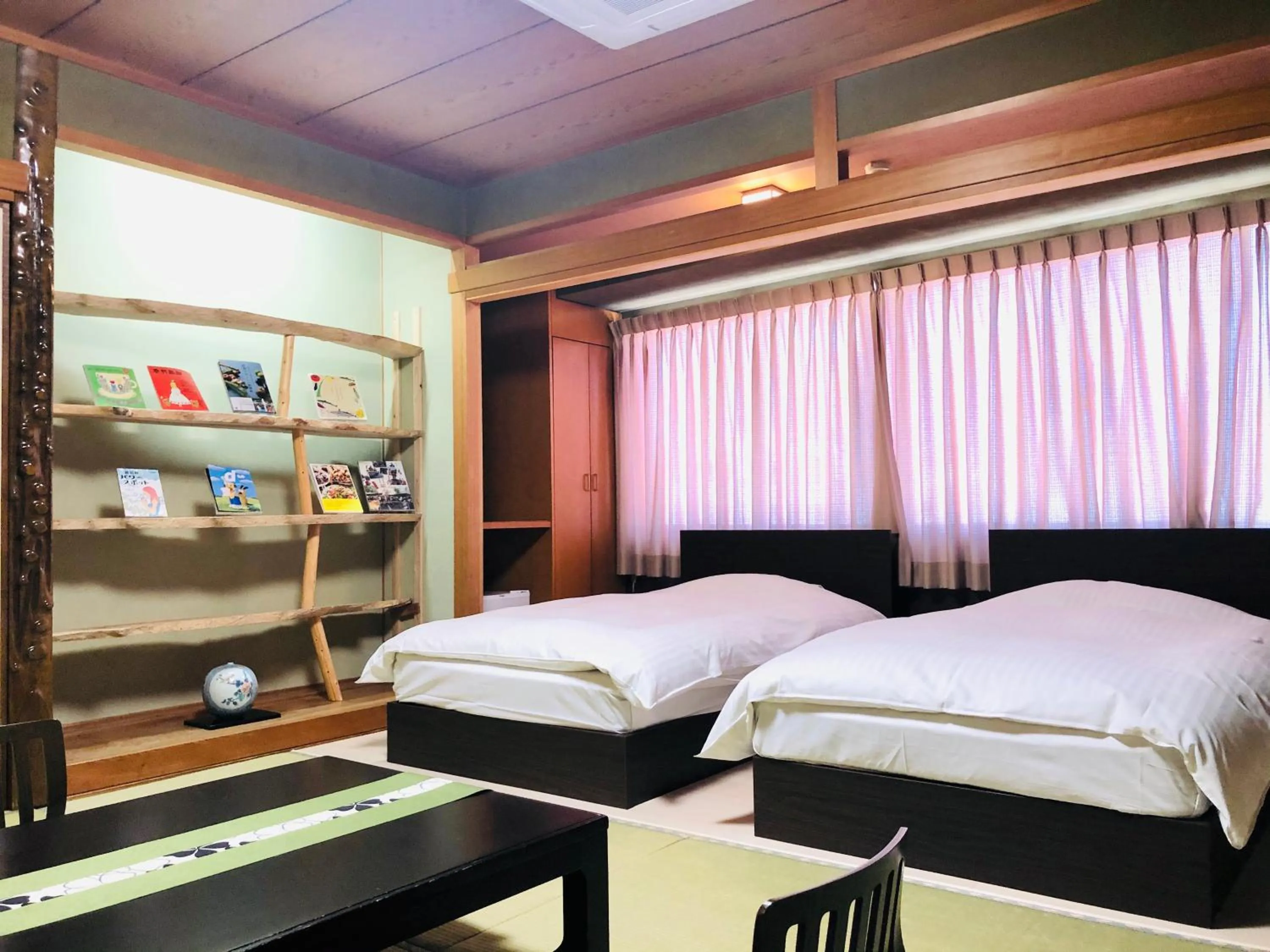 Bed in Hotel Takasago