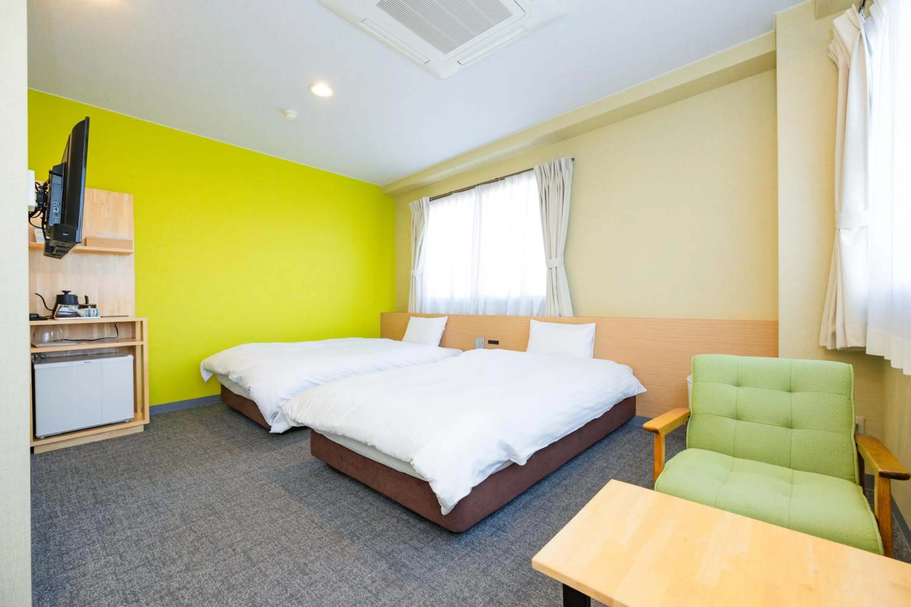 Bed in Hotel Takasago