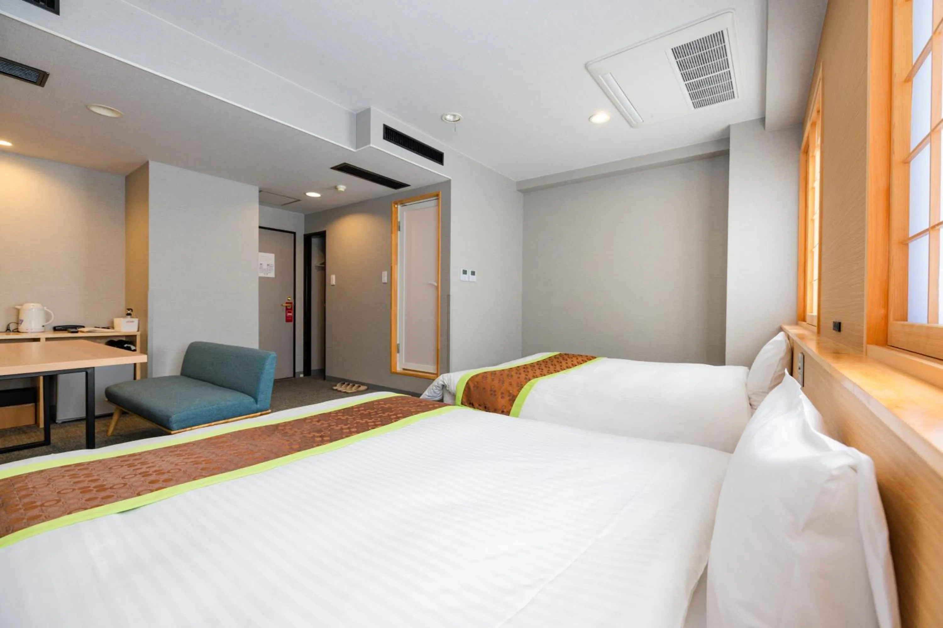 Bed in Hotel Takasago