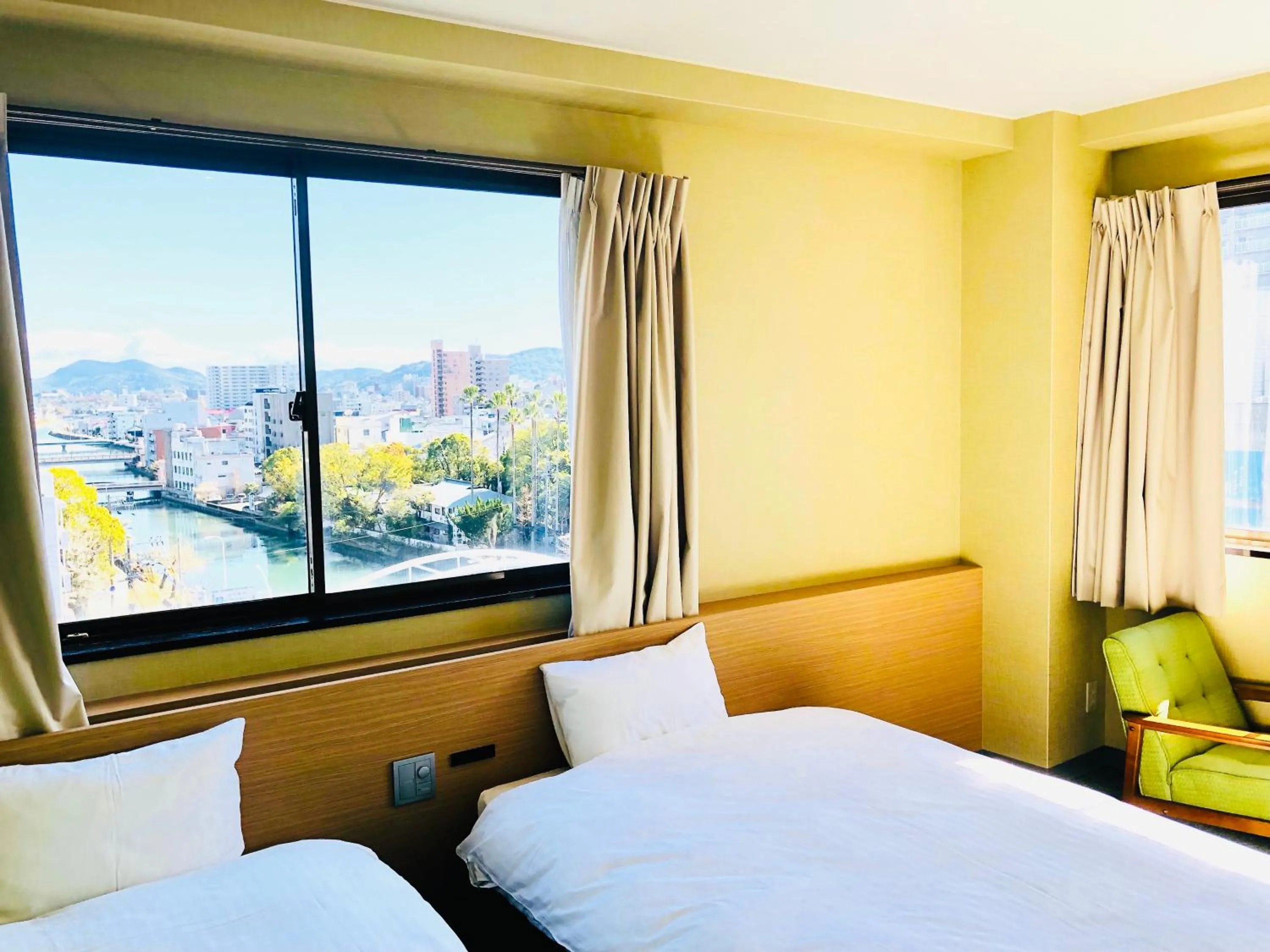 Bed in Hotel Takasago