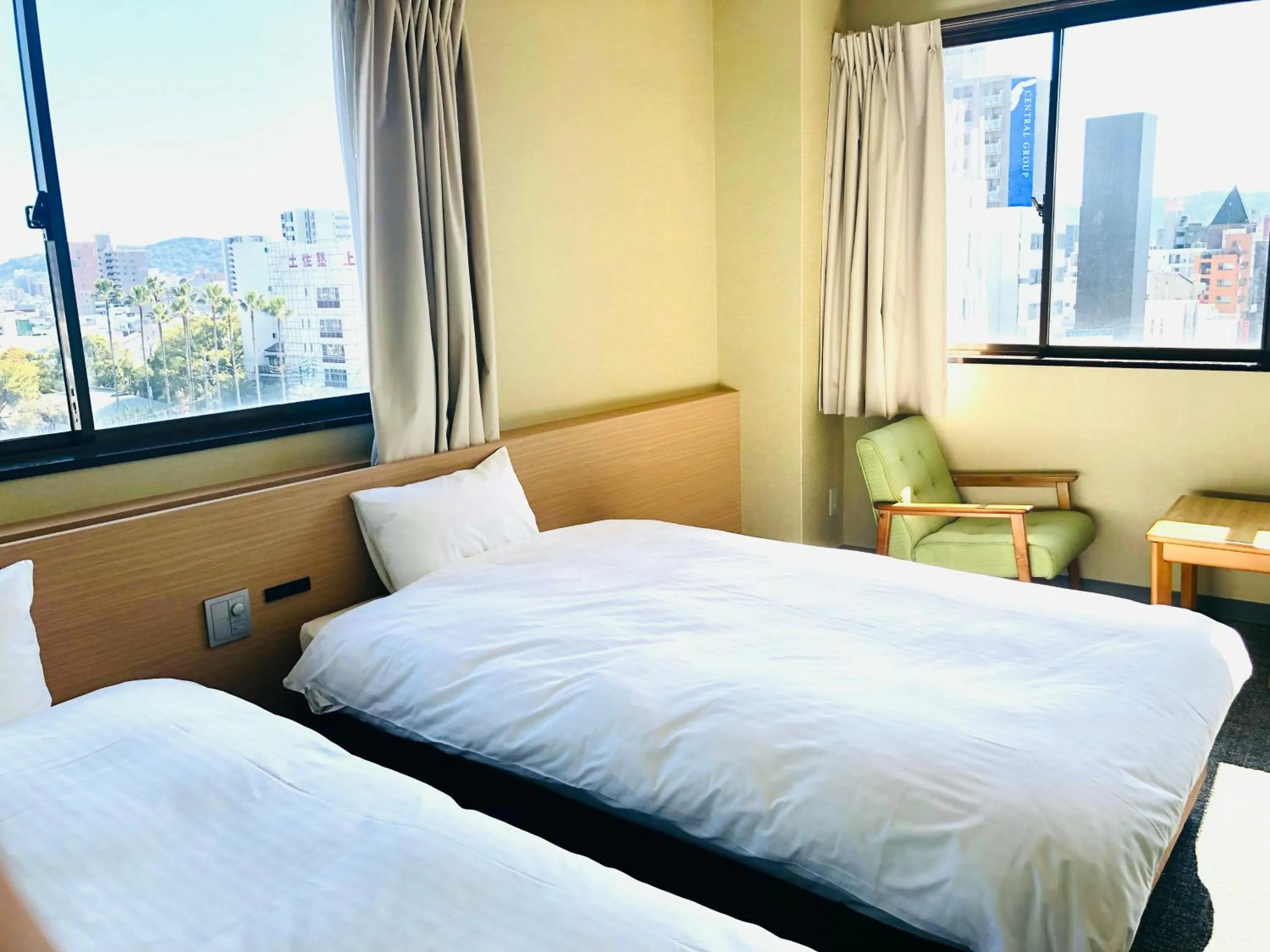 Bed in Hotel Takasago