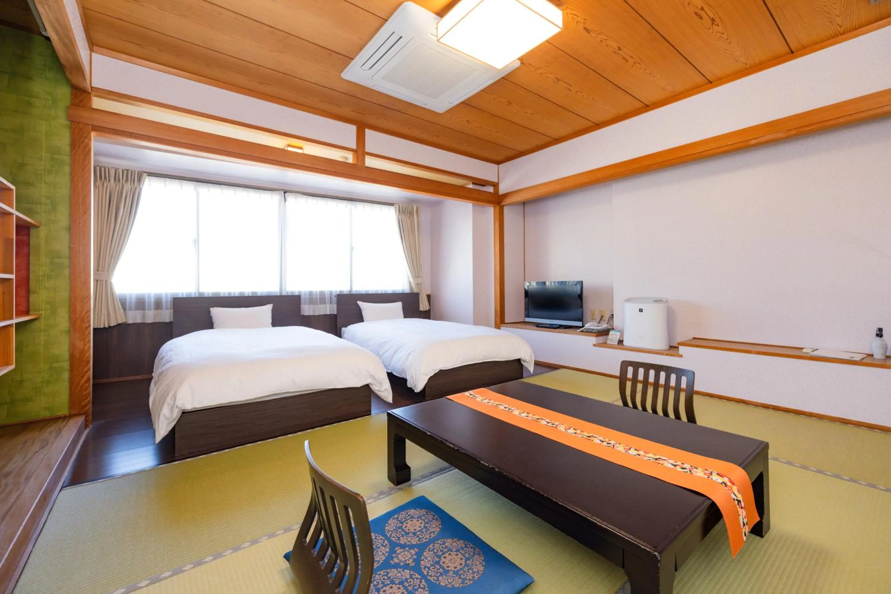 Bed in Hotel Takasago