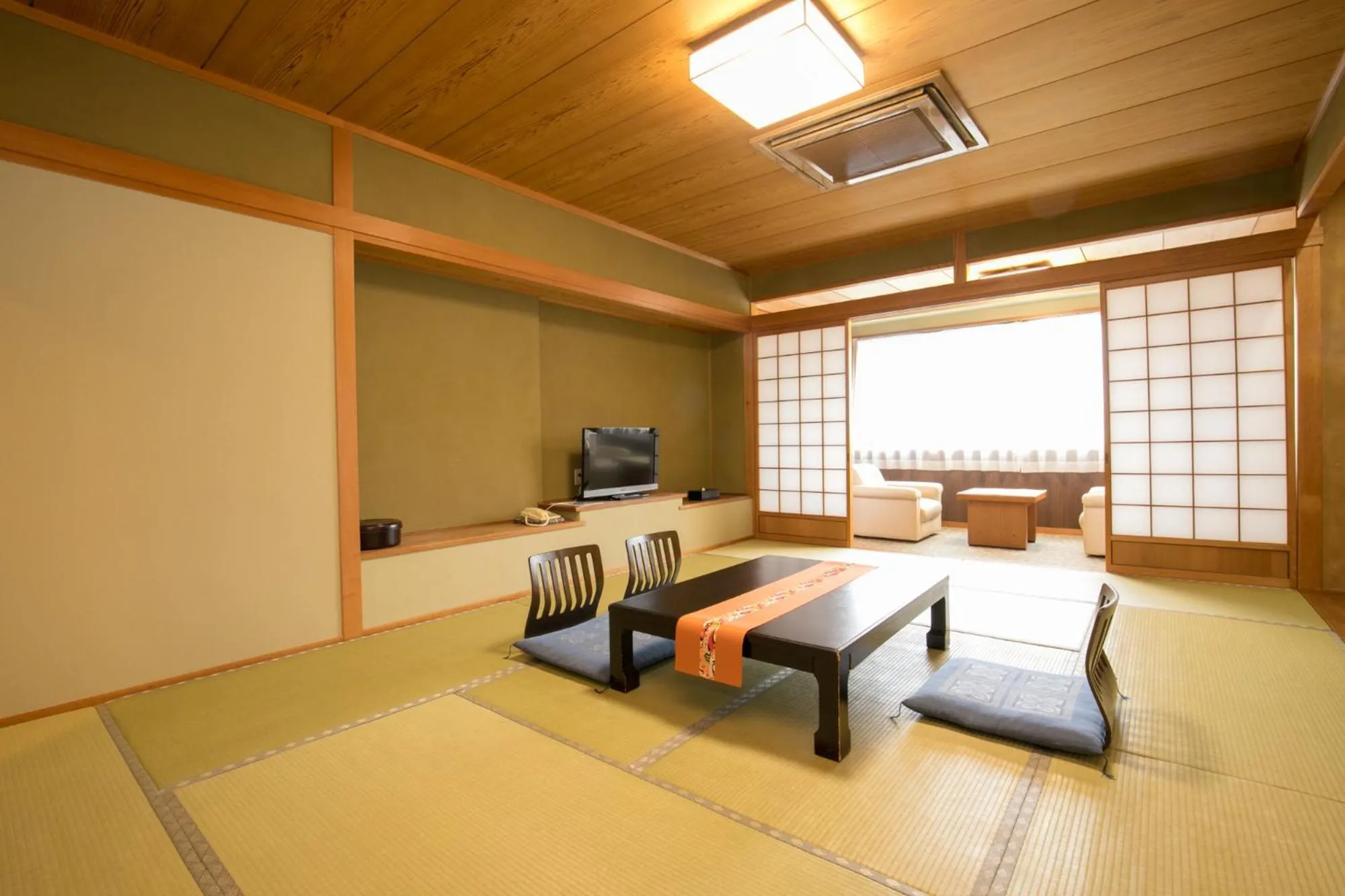 Bed in Hotel Takasago