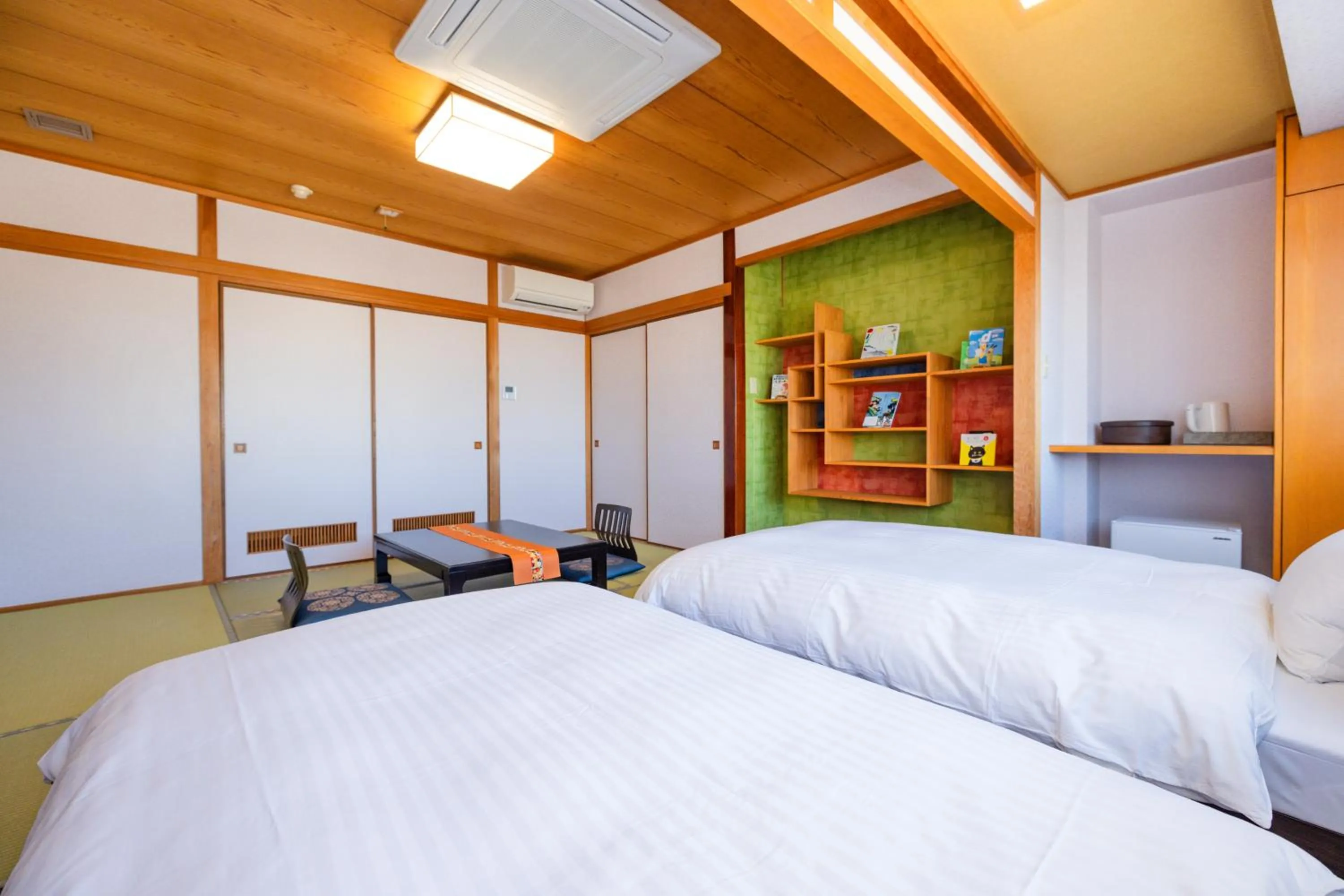 Bed in Hotel Takasago