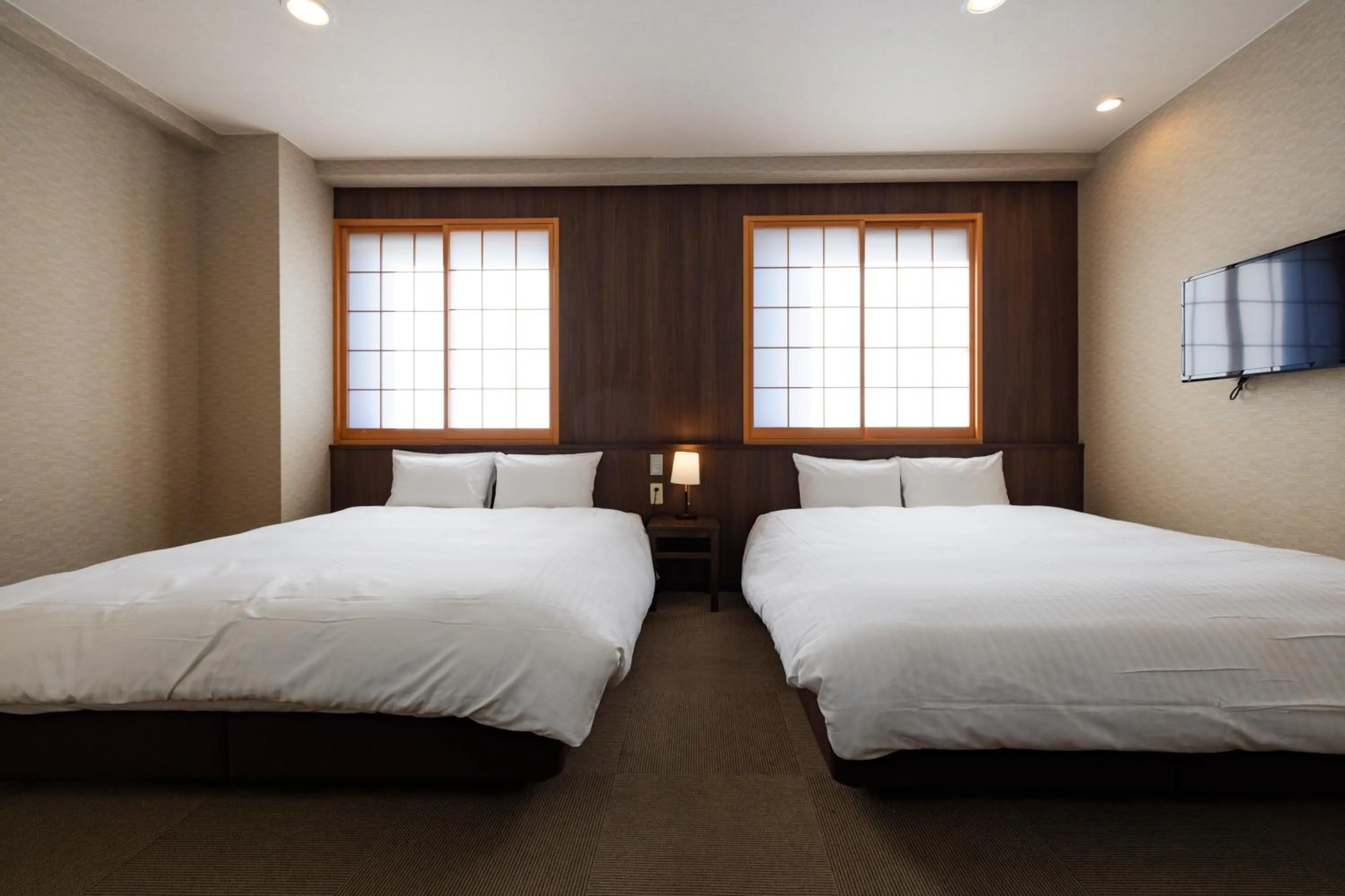Bed in Hotel Takasago