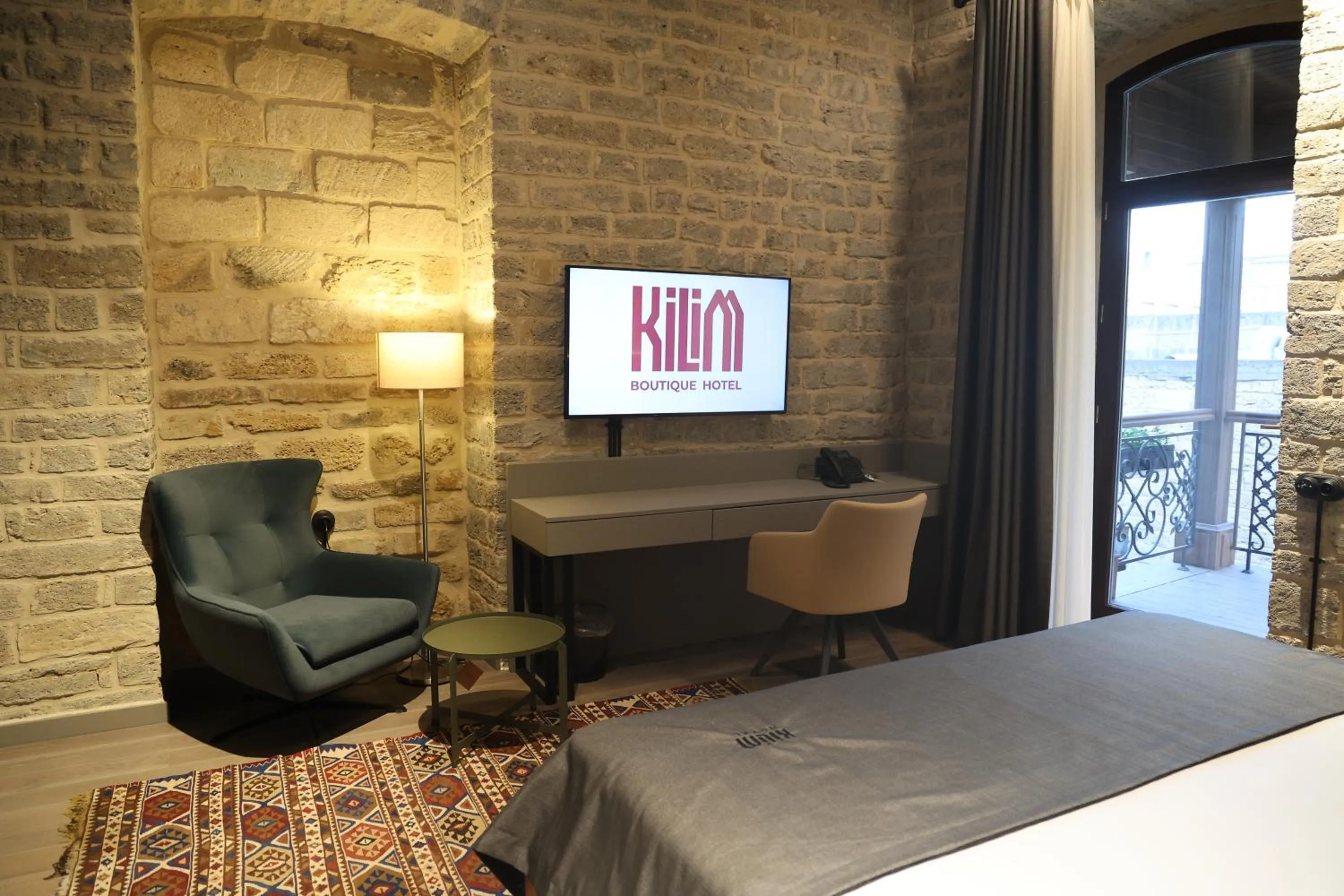 Bed in Kilim Boutique Hotel