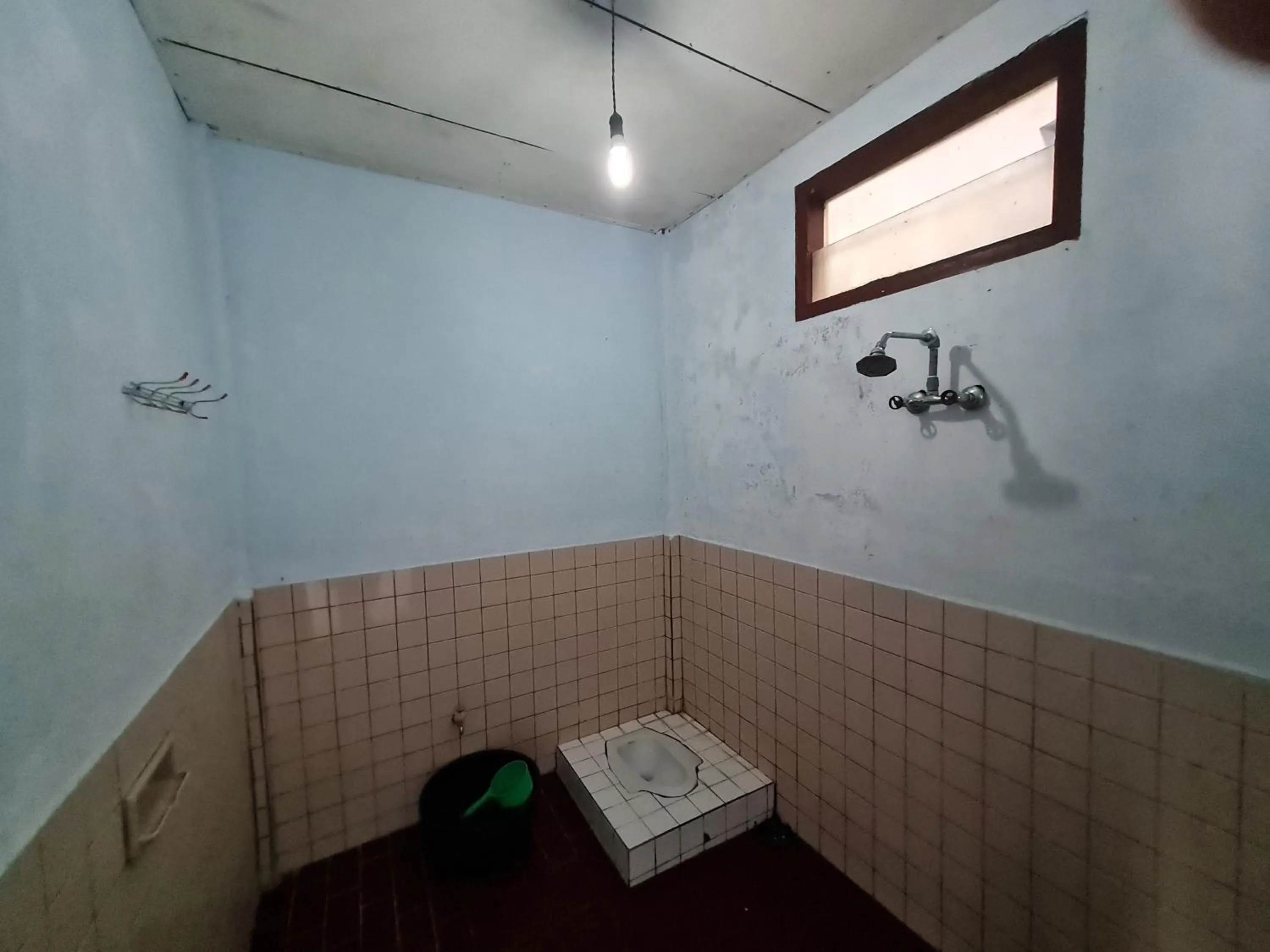 Shower in Abadi Guest House