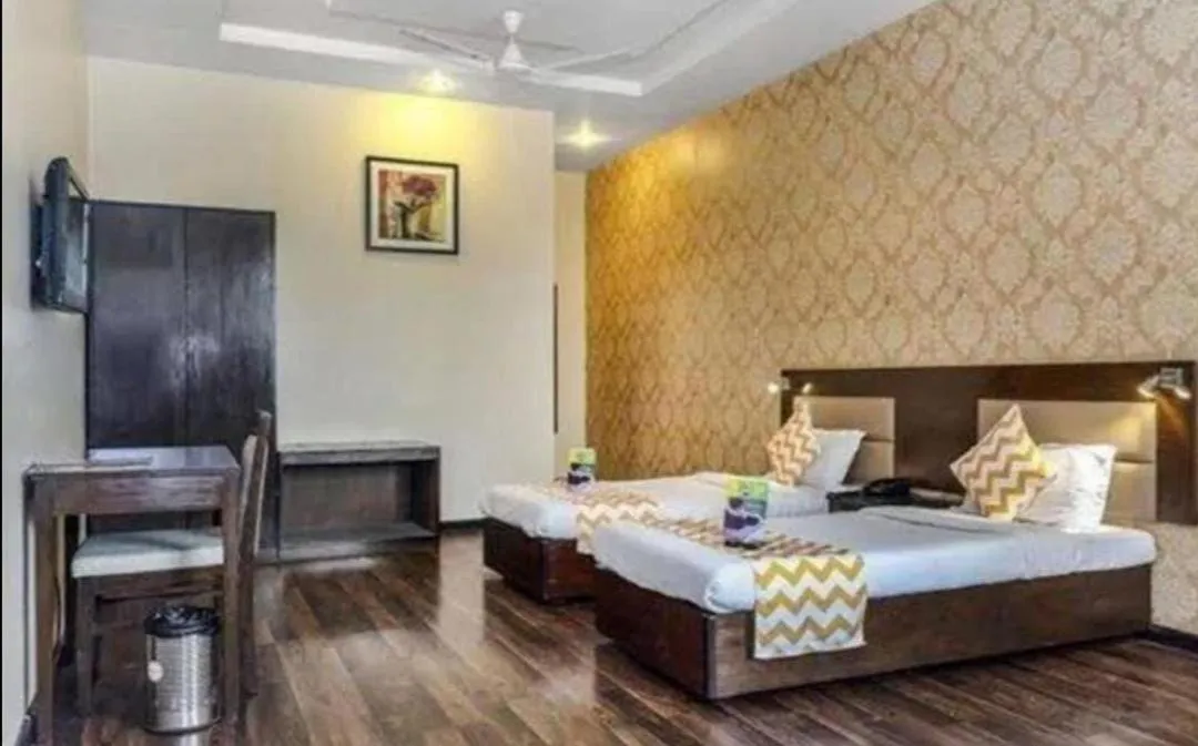 Bed in Riddhi Inn