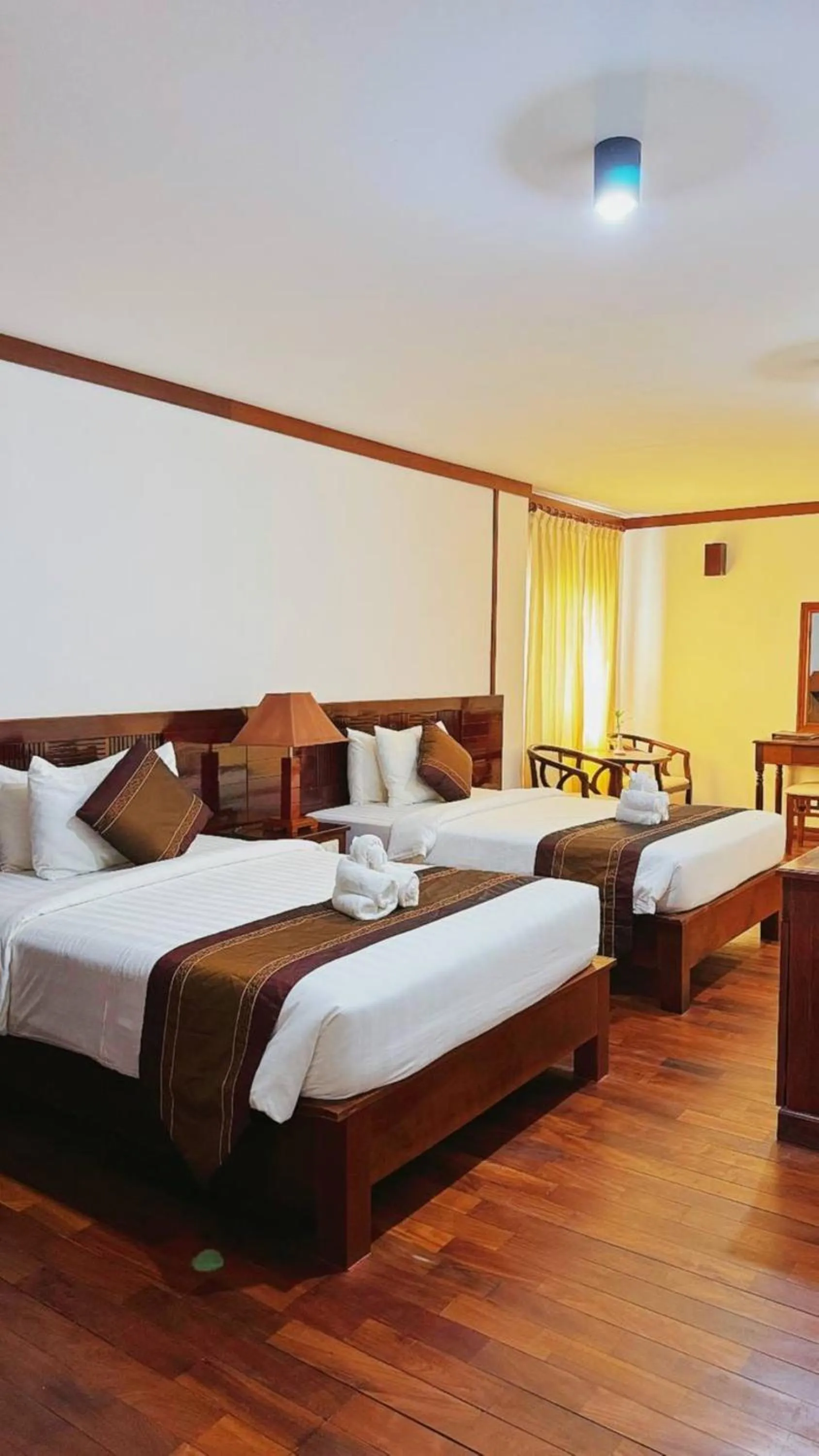 Photo of the whole room, Bed in EG Paradise Angkor Villa Hotel