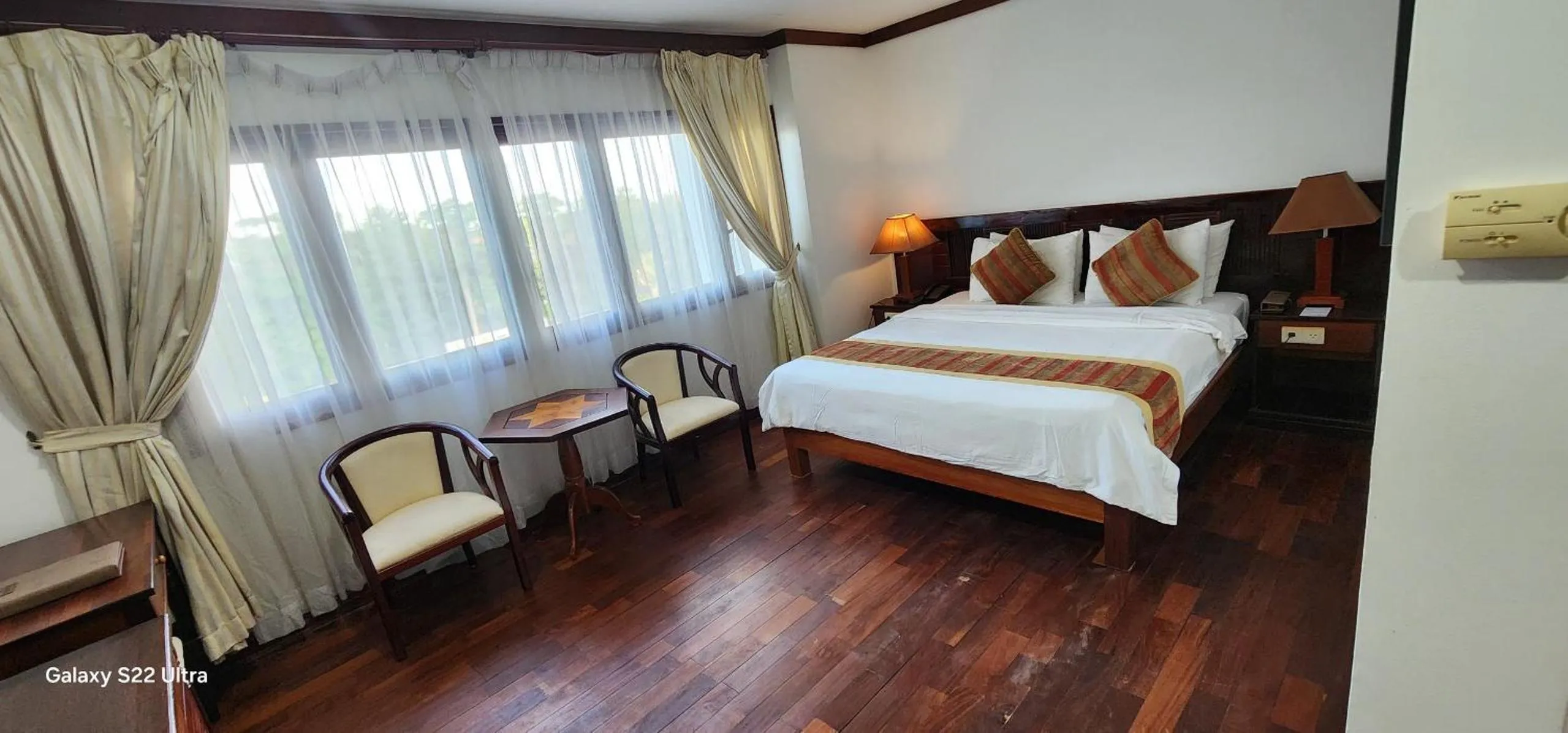 Photo of the whole room, Bed in EG Paradise Angkor Villa Hotel
