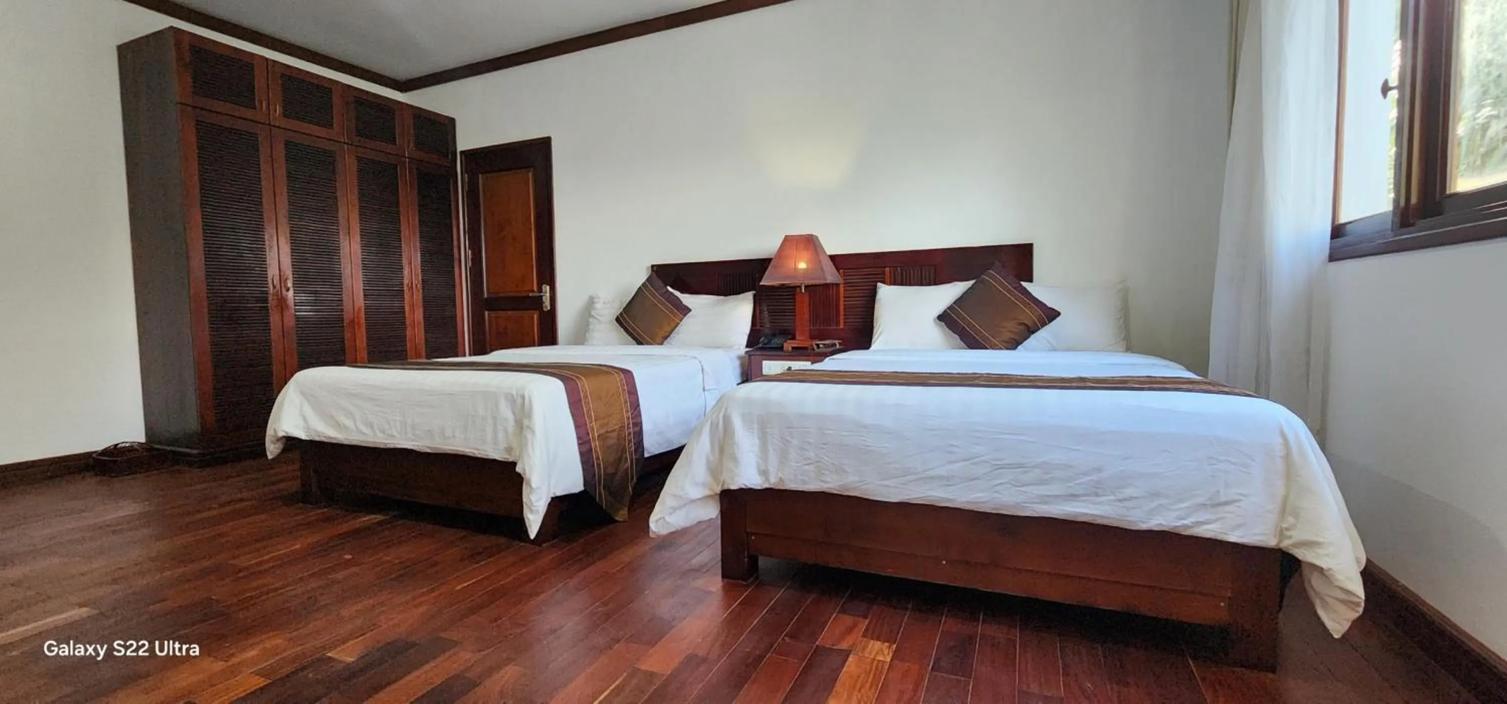 Photo of the whole room, Bed in EG Paradise Angkor Villa Hotel
