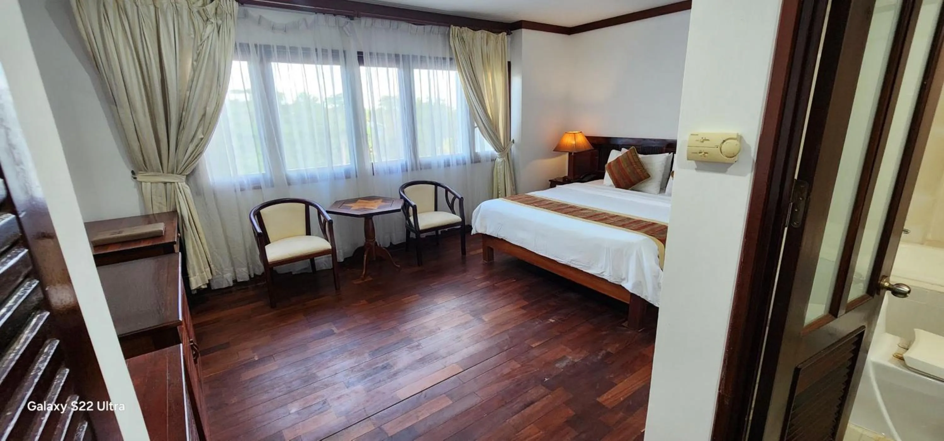 Photo of the whole room, Bed in EG Paradise Angkor Villa Hotel