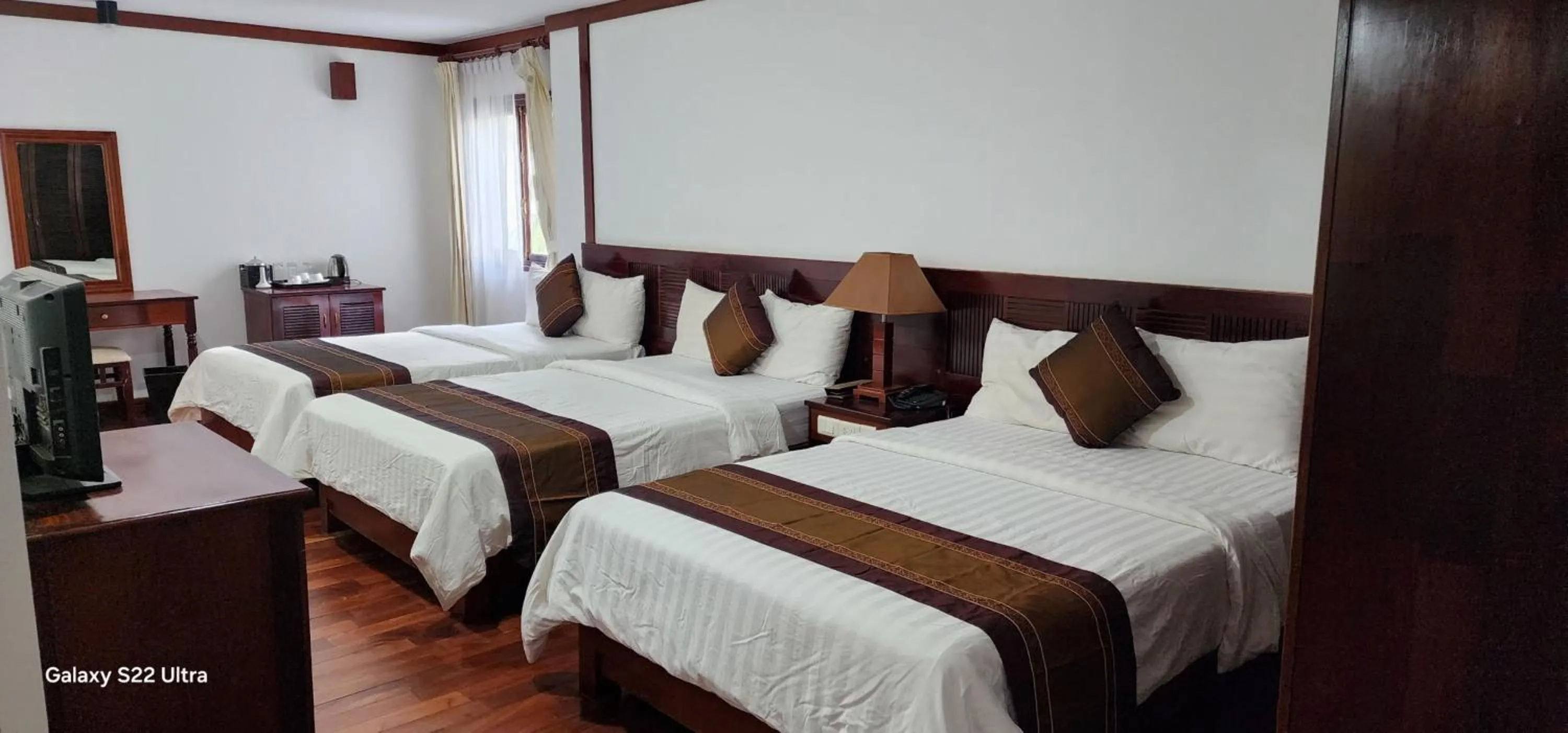 Photo of the whole room, Bed in EG Paradise Angkor Villa Hotel