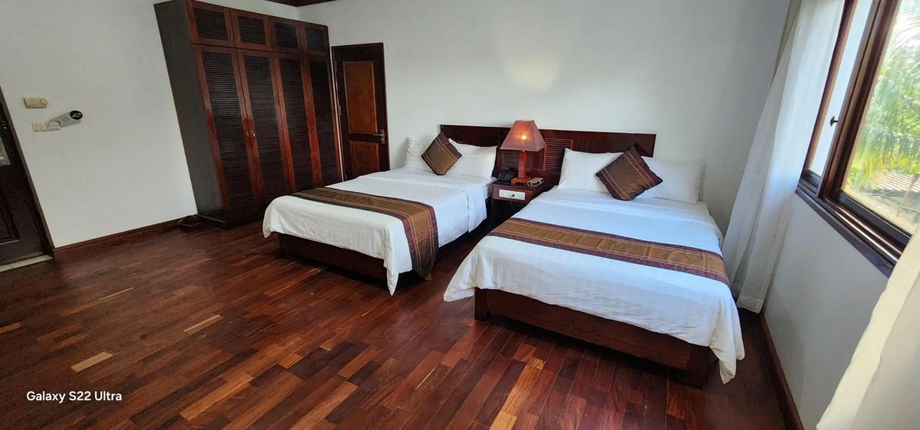 Photo of the whole room, Bed in EG Paradise Angkor Villa Hotel