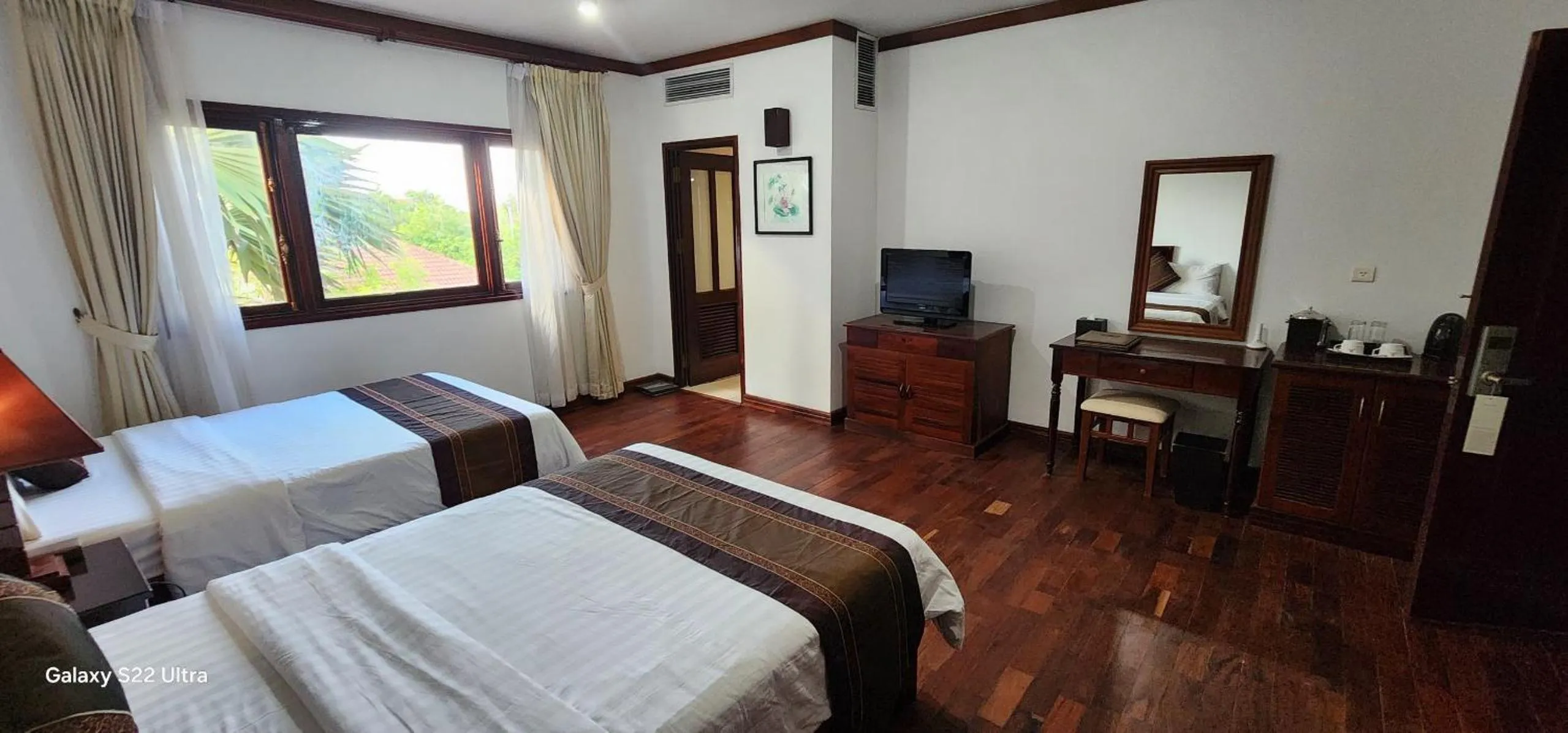 Photo of the whole room, Bed in EG Paradise Angkor Villa Hotel