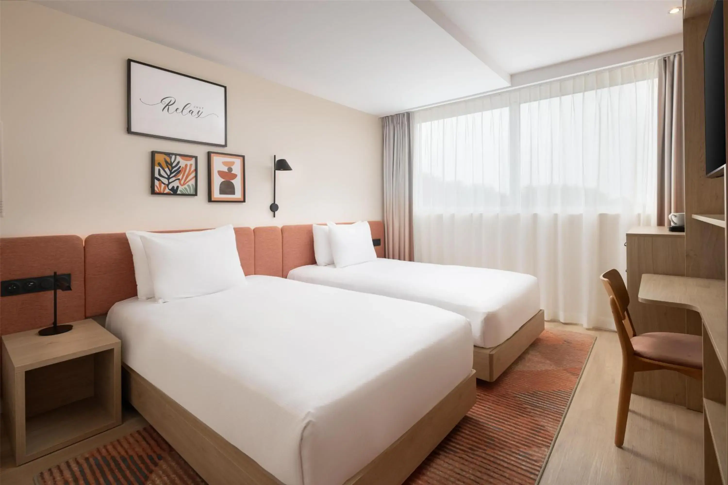 Bed in Hampton By Hilton Paris Charles De Gaulle Airport Bed in Hampton By Hilton Paris Charles De Gaulle Airport