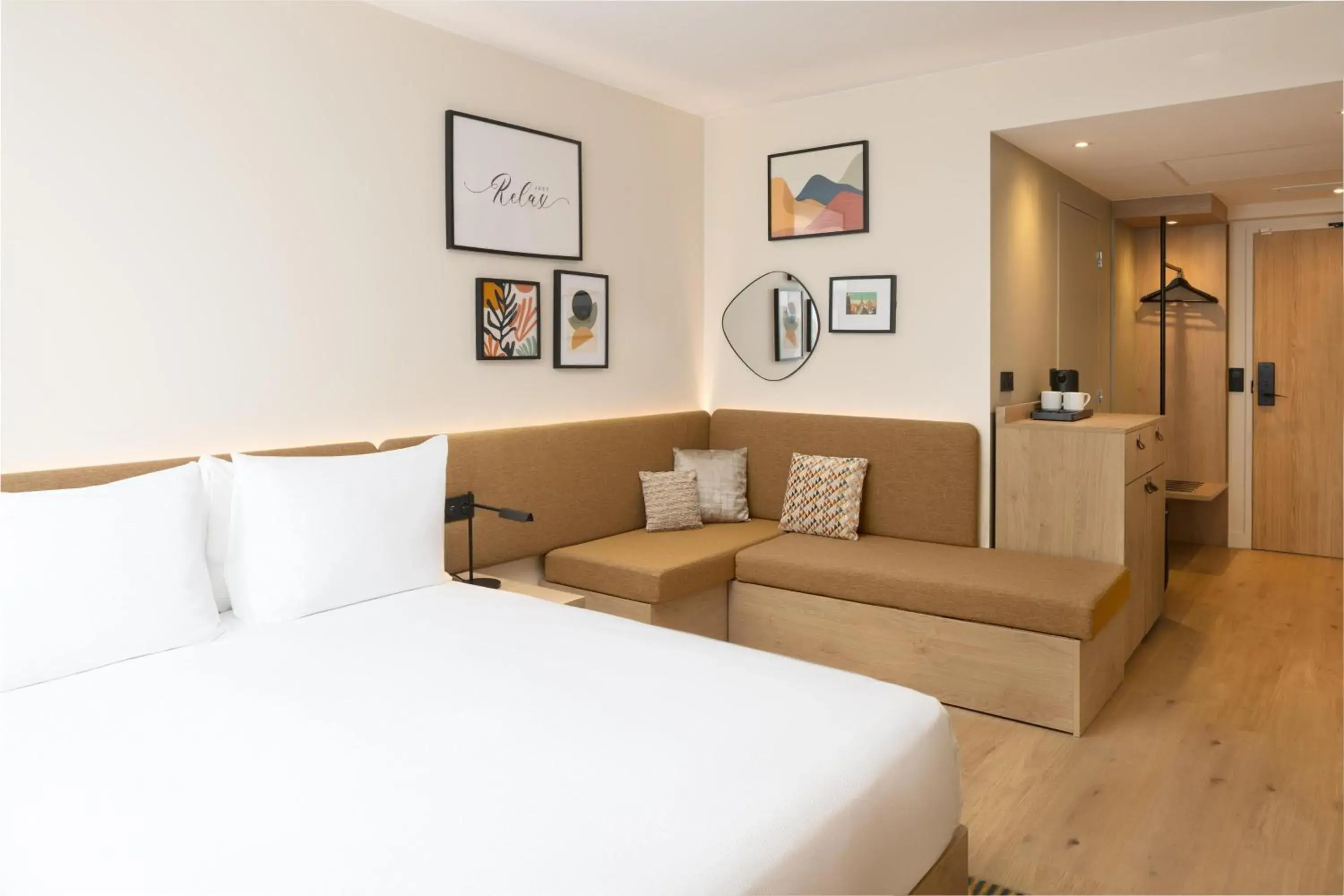 Living room, Bed in Hampton By Hilton Paris Charles De Gaulle Airport Living room, Bed in Hampton By Hilton Paris Charles De Gaulle Airport
