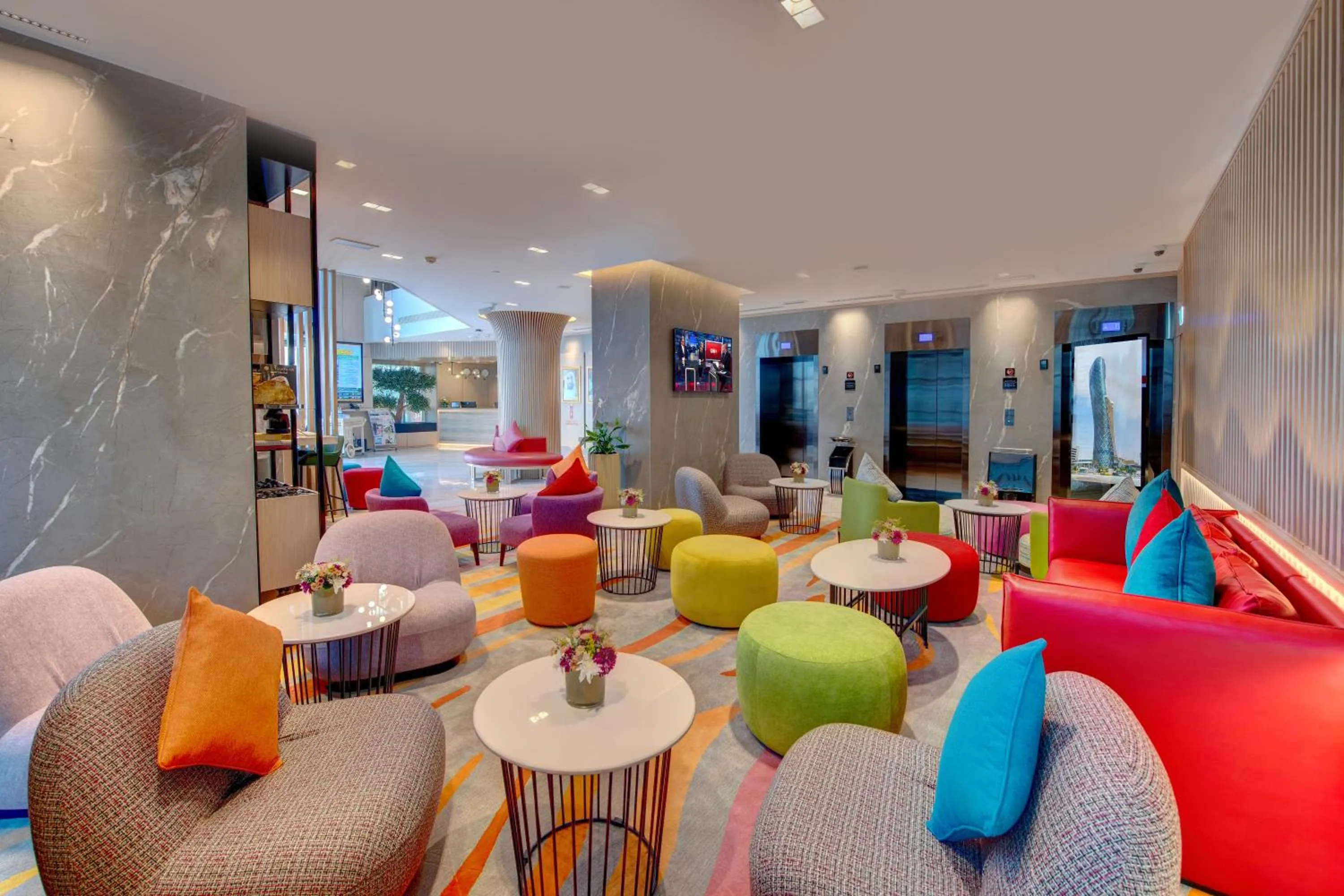 Lobby or reception in La Quinta by Wyndham Abu Dhabi Al Wahda