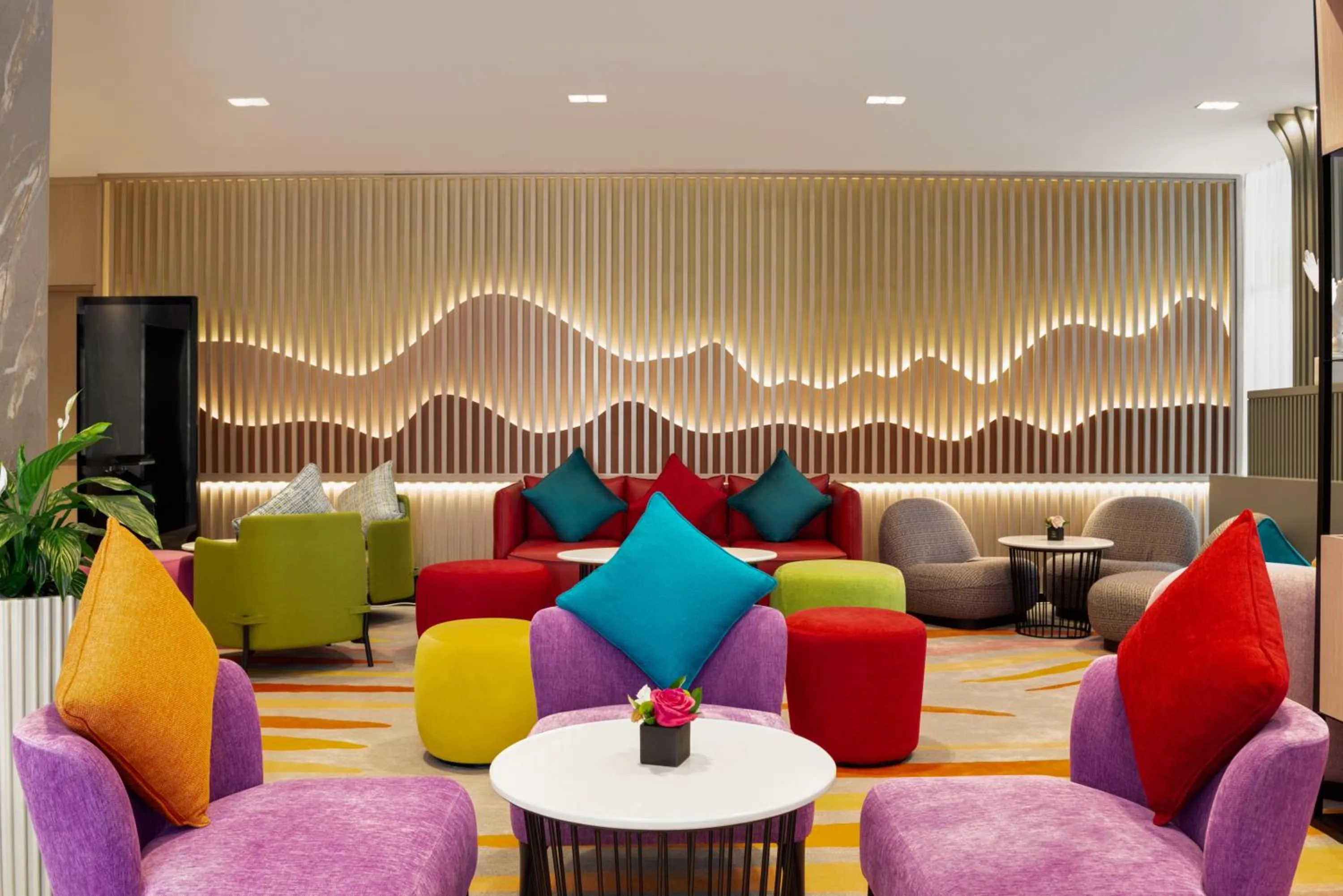 Lobby or reception in La Quinta by Wyndham Abu Dhabi Al Wahda