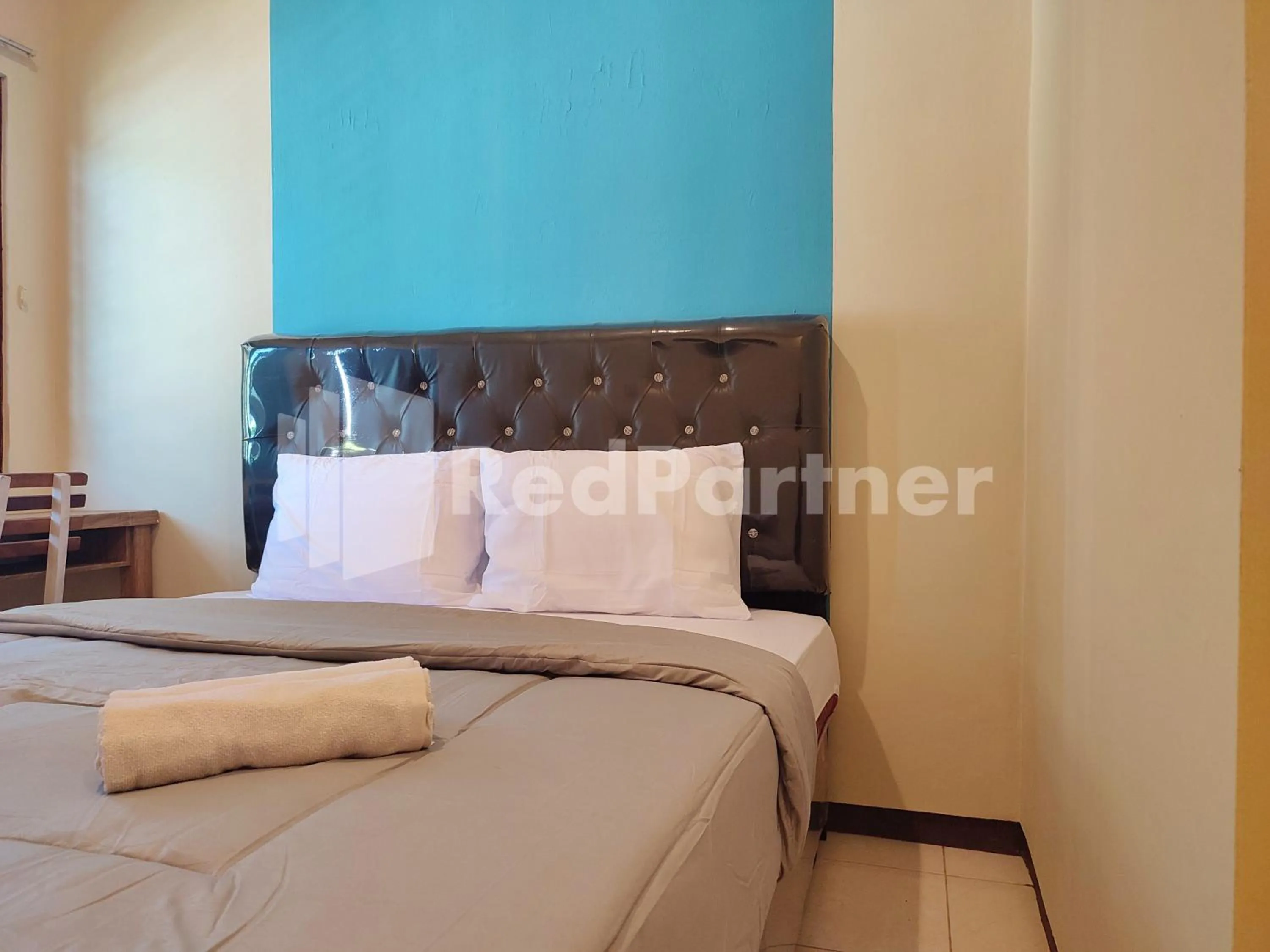 Bedroom, Bed in Mutiara Residence Near Simpang Lima Mitra RedDoorz