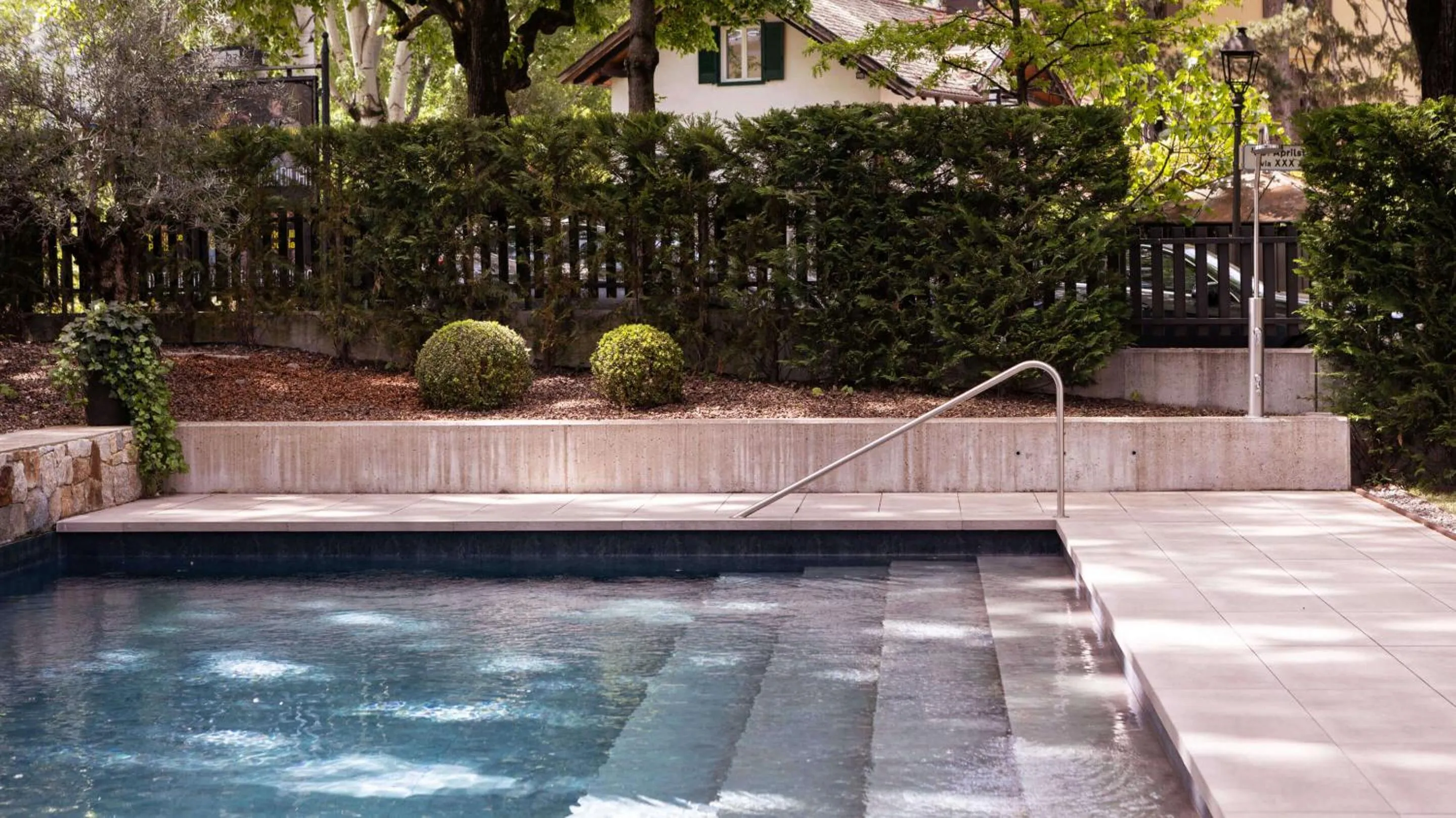 Swimming pool in Flora Hotel & Suites