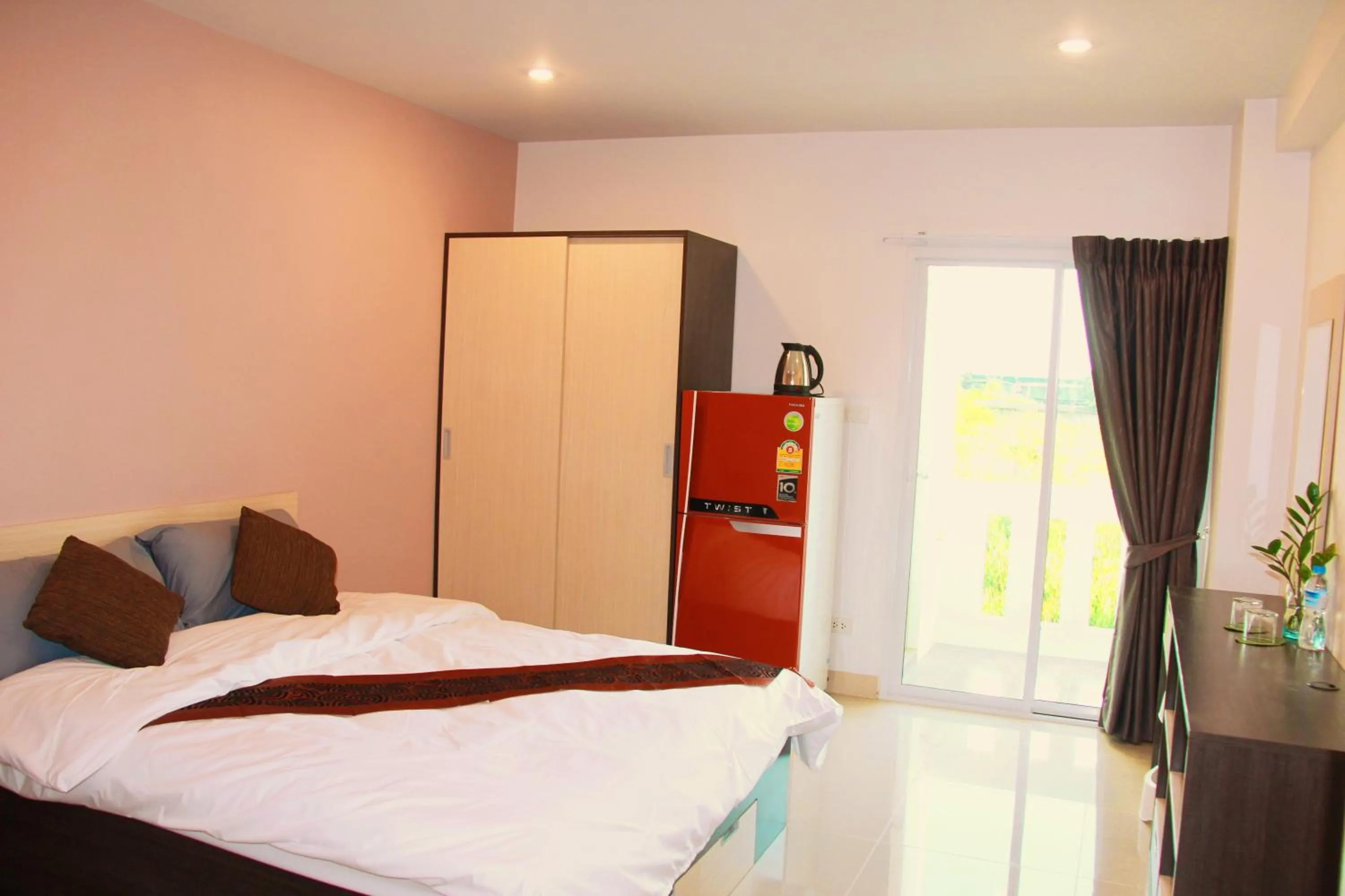 Photo of the whole room, Bed in At Ease Hotel Suvarnabhumi