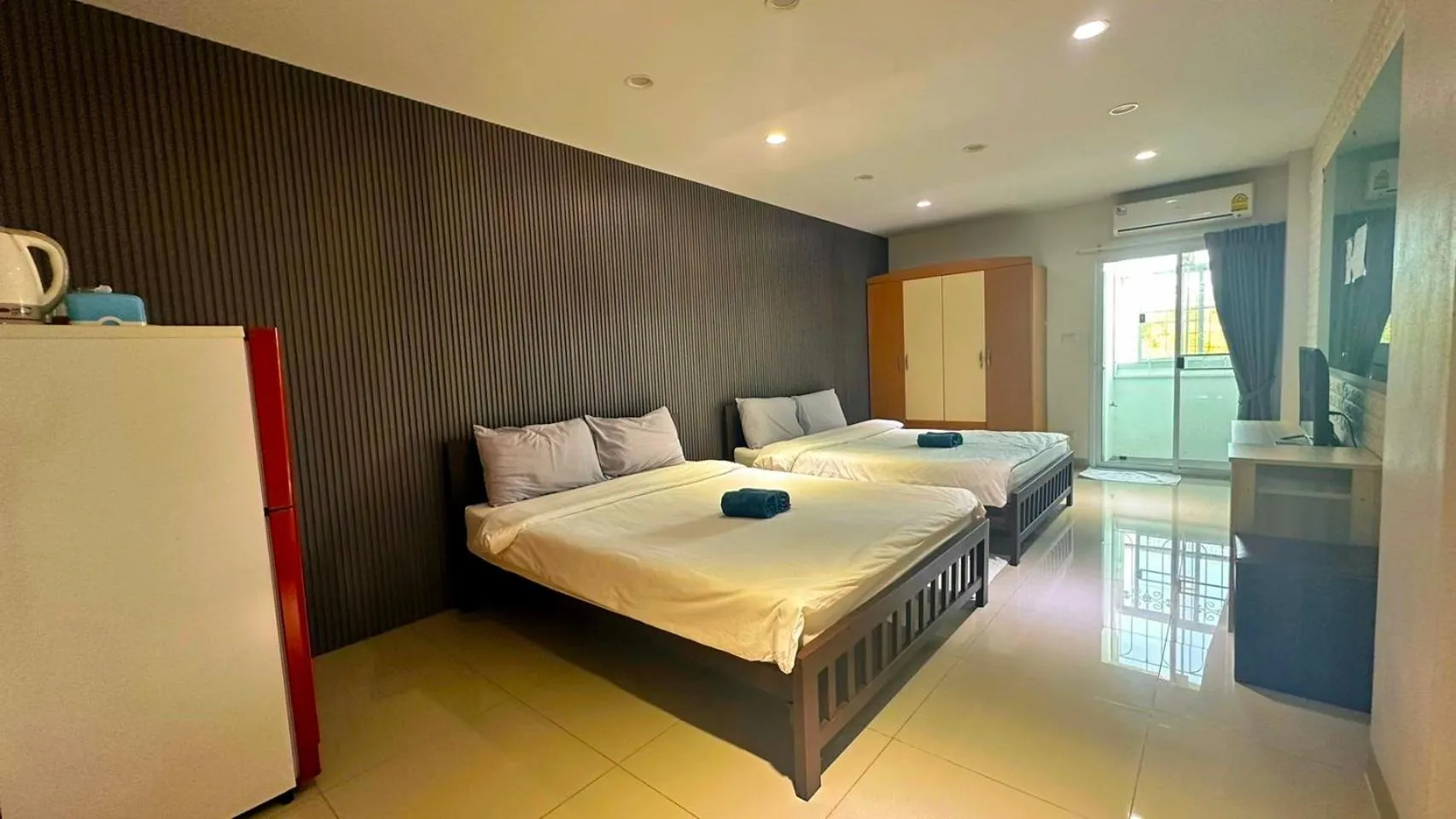 Bed in At Ease Hotel Suvarnabhumi