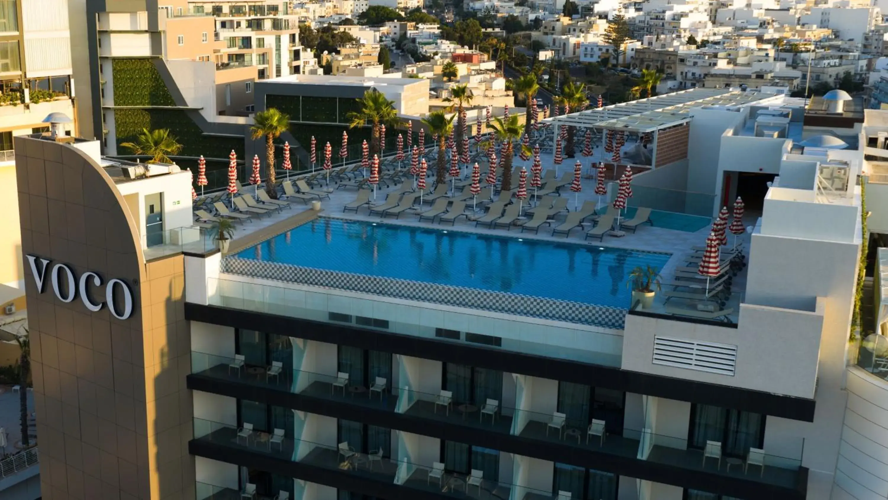 Swimming pool in voco Malta by IHG Swimming pool in voco Malta by IHG