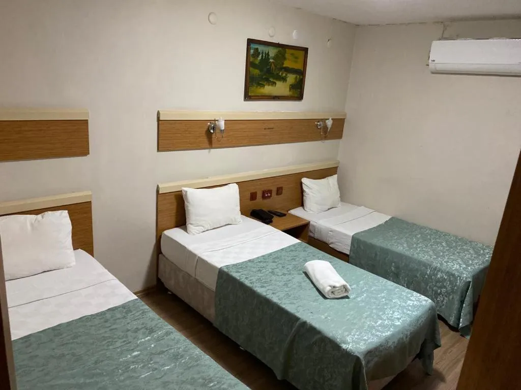 Bed in Hotel Oz Villa