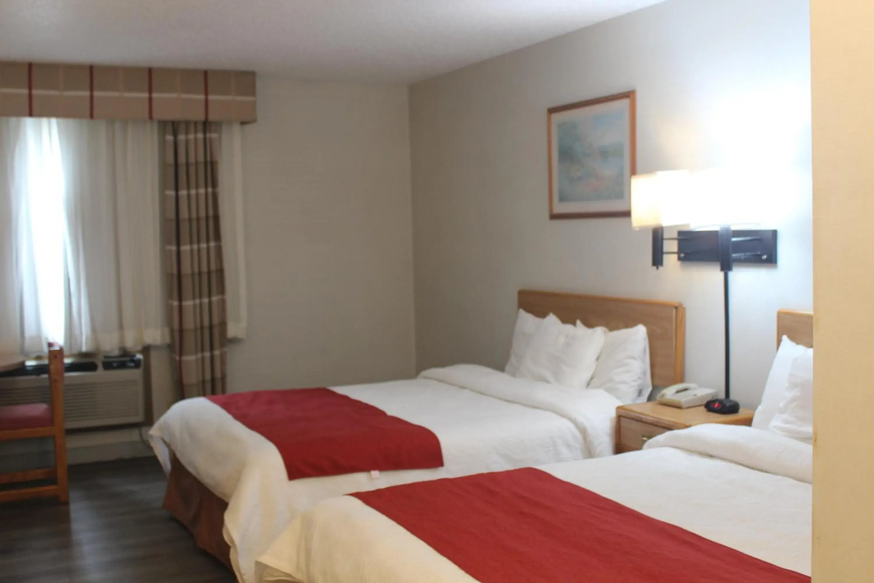 Standard Queen Room in Eastwood Inn Standard Queen Room in Eastwood Inn