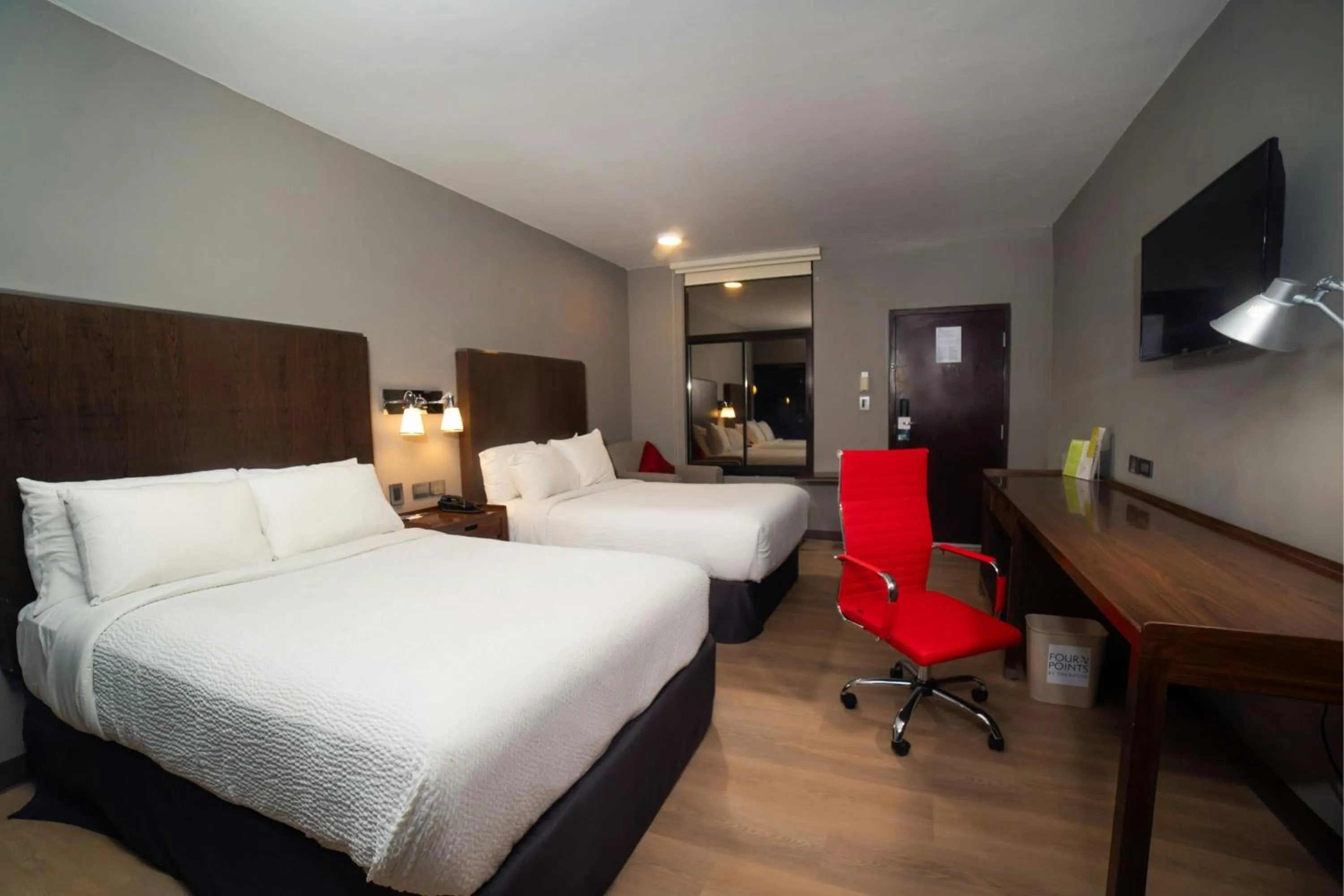 Photo of the whole room, Bed in Four Points by Sheraton Saltillo