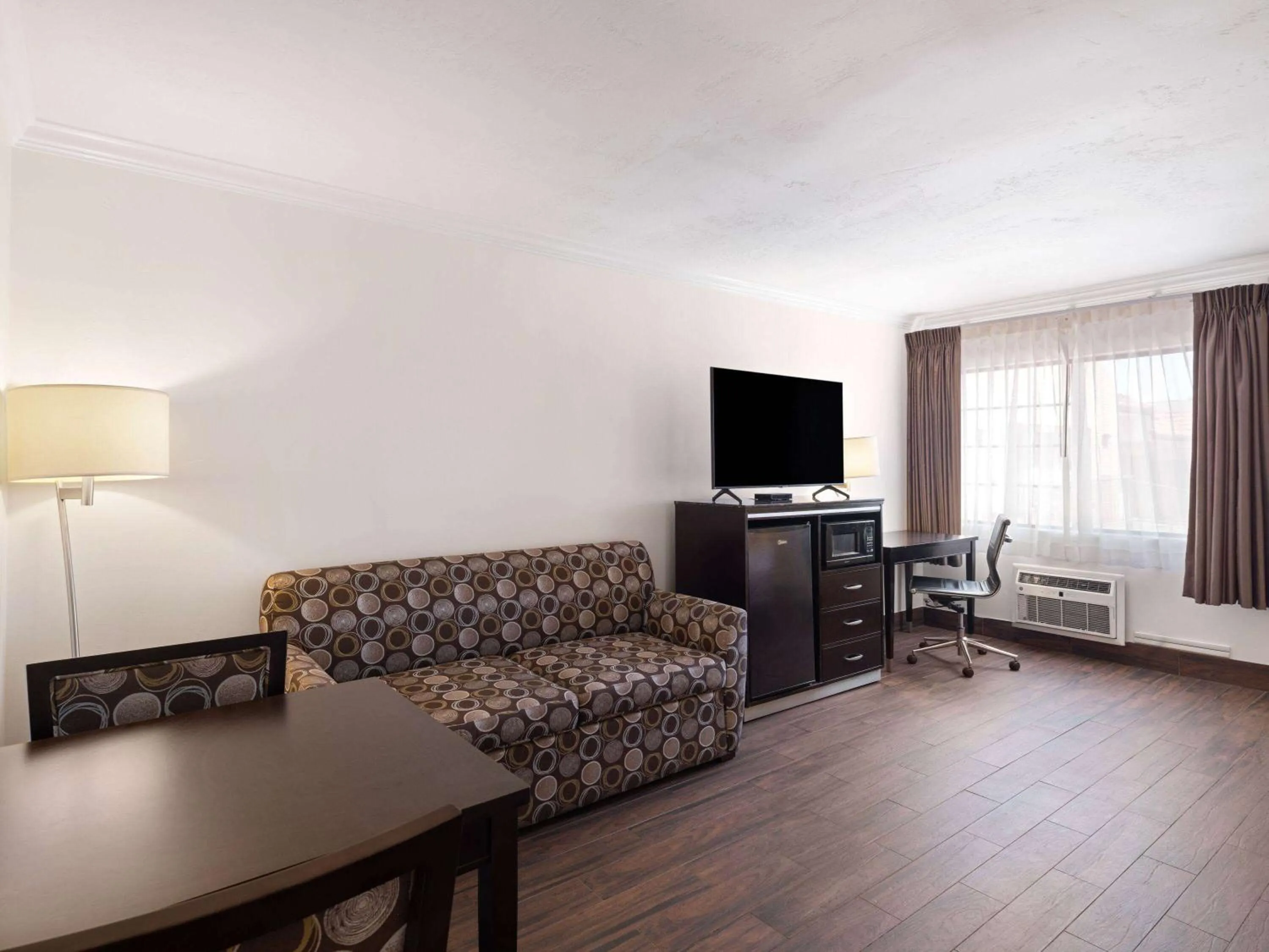 Bed in Ramada by Wyndham San Diego Poway Miramar