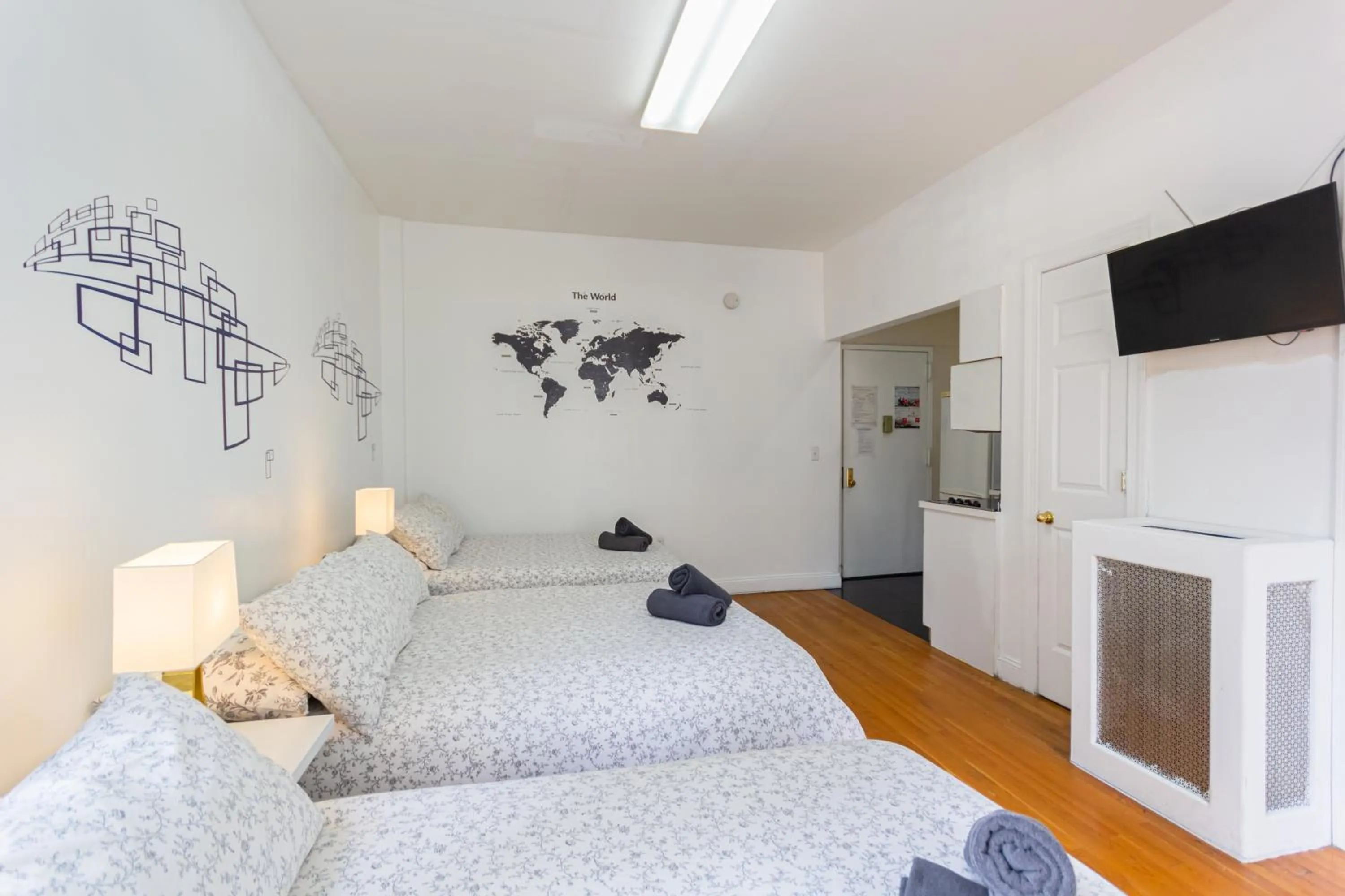 Bed in Studio Plus - Cozy Apartments