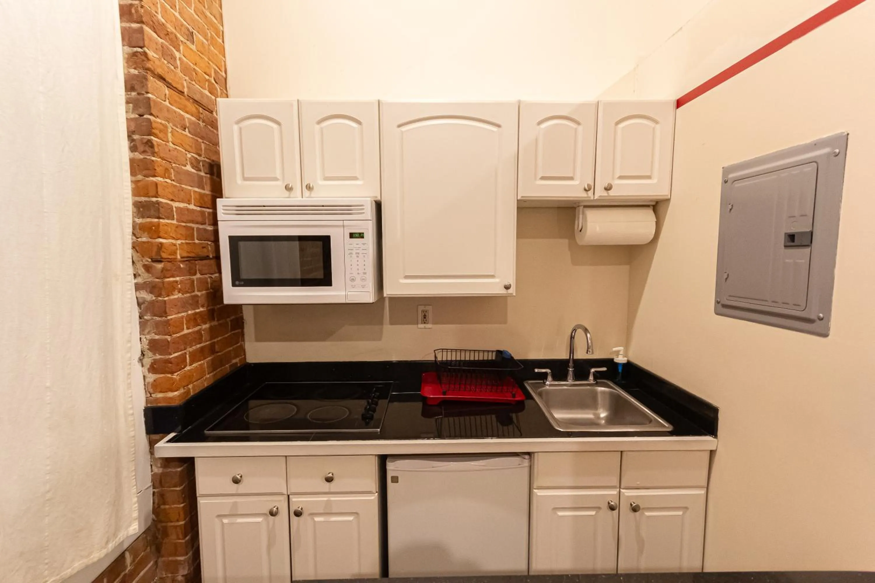 kitchen in Studio Plus - Cozy Apartments