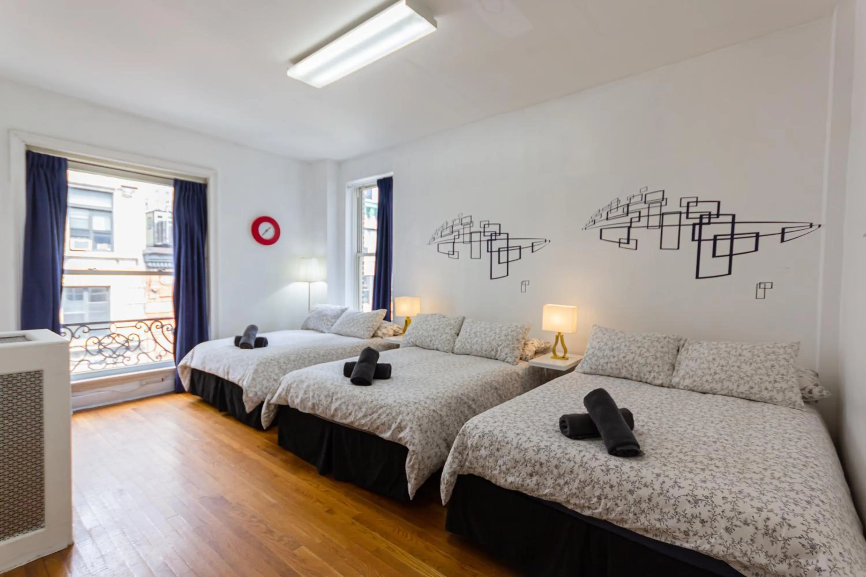 Bed in Studio Plus - Cozy Apartments