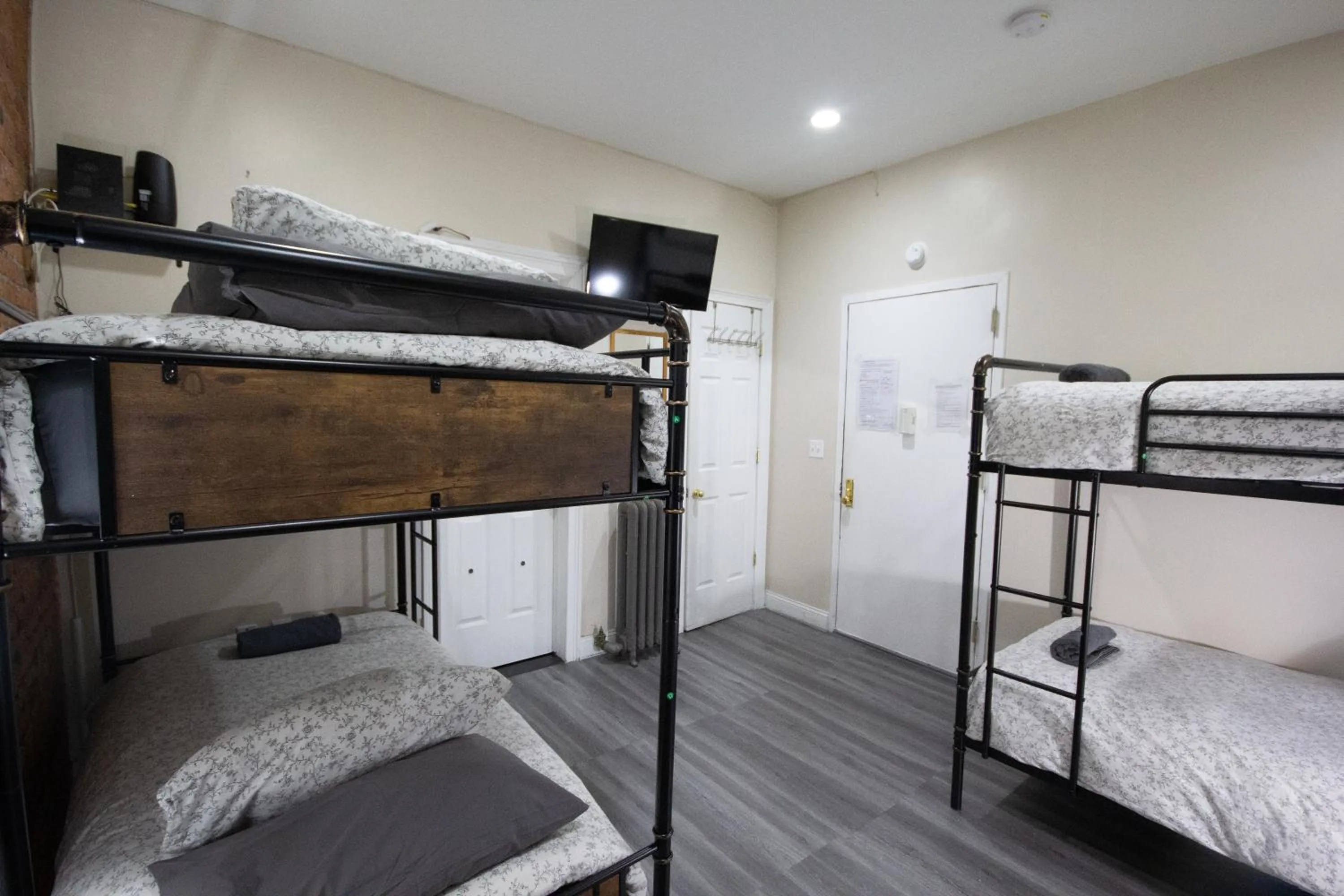 Bed in Studio Plus - Cozy Apartments