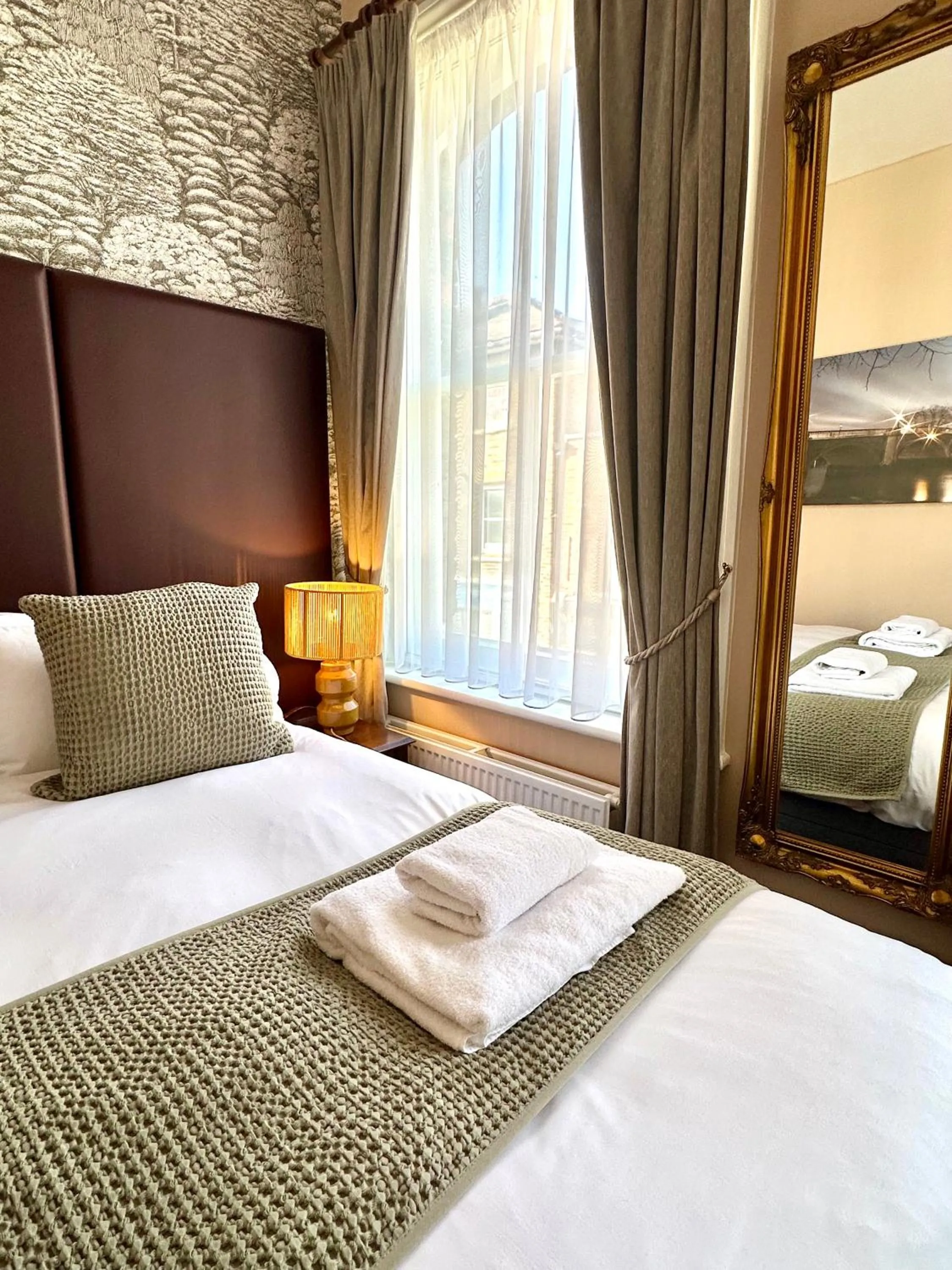 Bed in The Red Cow - Guest House