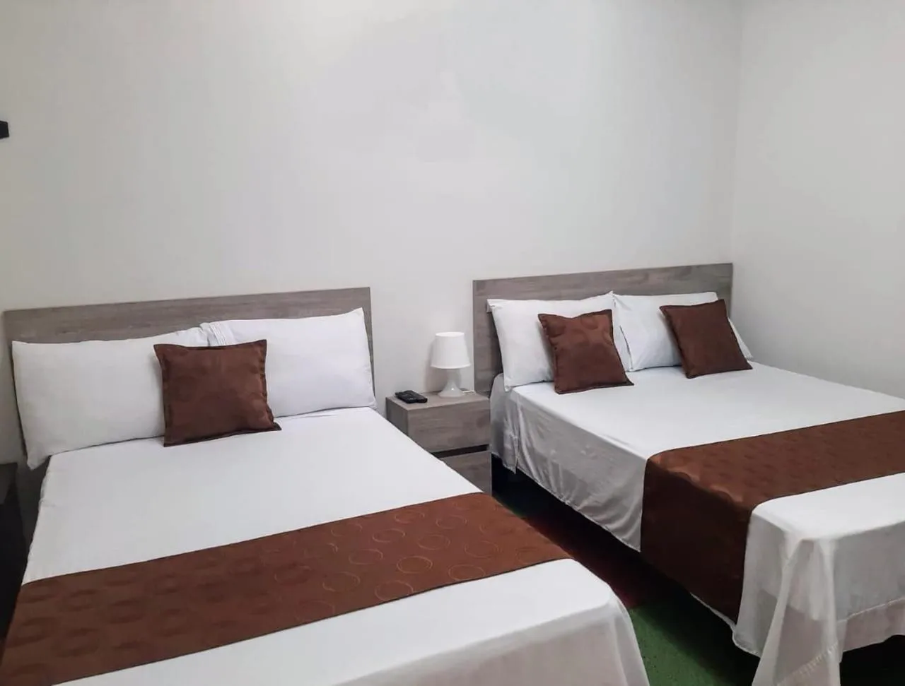Double Room with Two Double Beds in Hotel Cafetto
