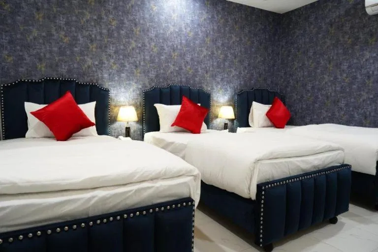 Bed in Hotel Relax Inn Rawalpindi