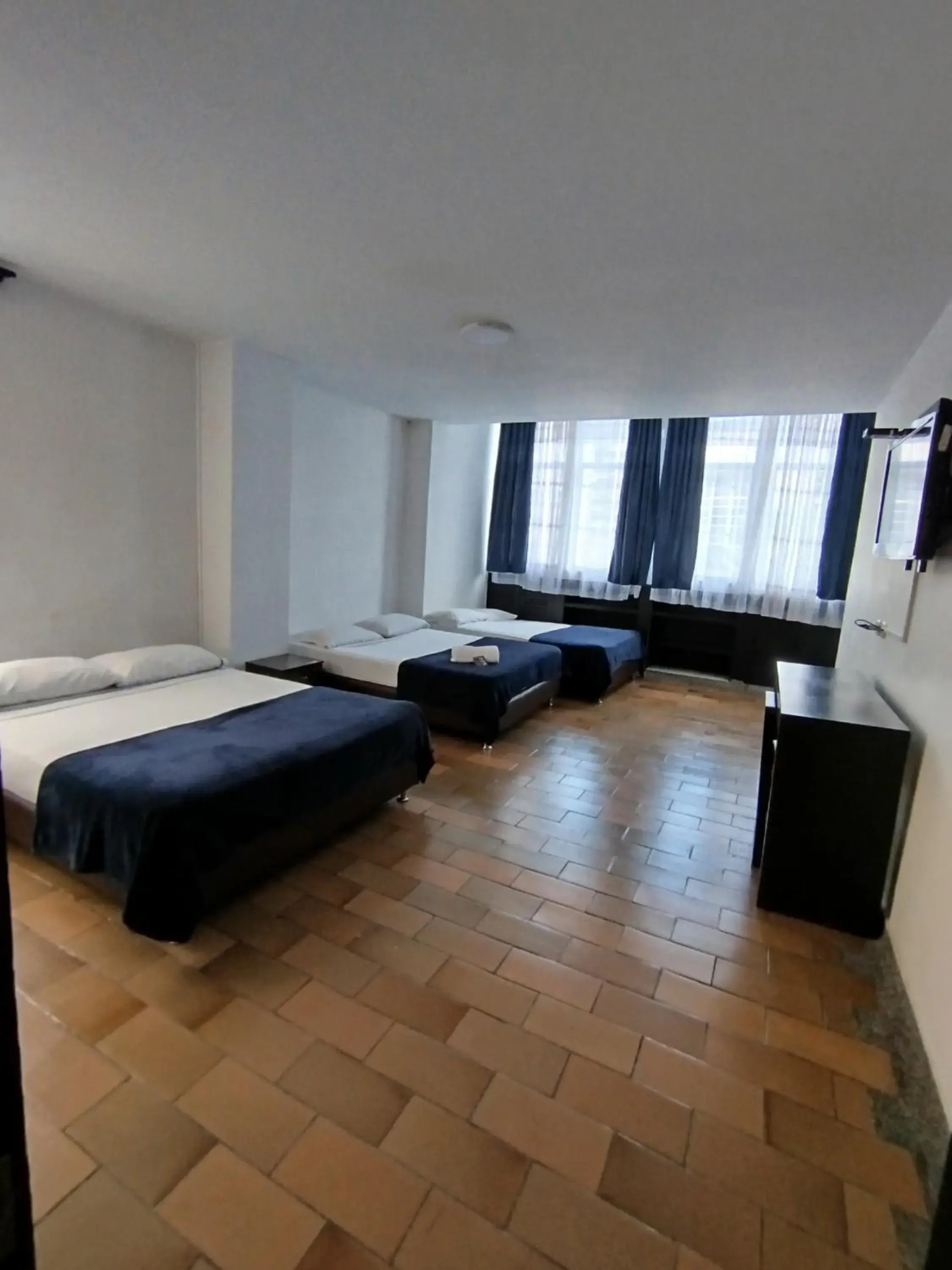 Deluxe Triple Room in Hotel Catalina Plaza Pereira Deluxe Triple Room in Hotel Catalina Plaza Pereira
