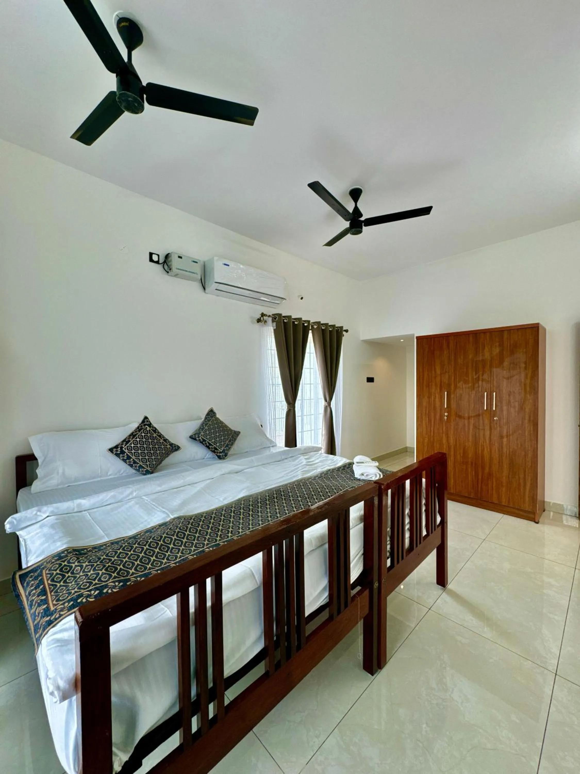 Bedroom in ECR Holidays Lavish Homestay