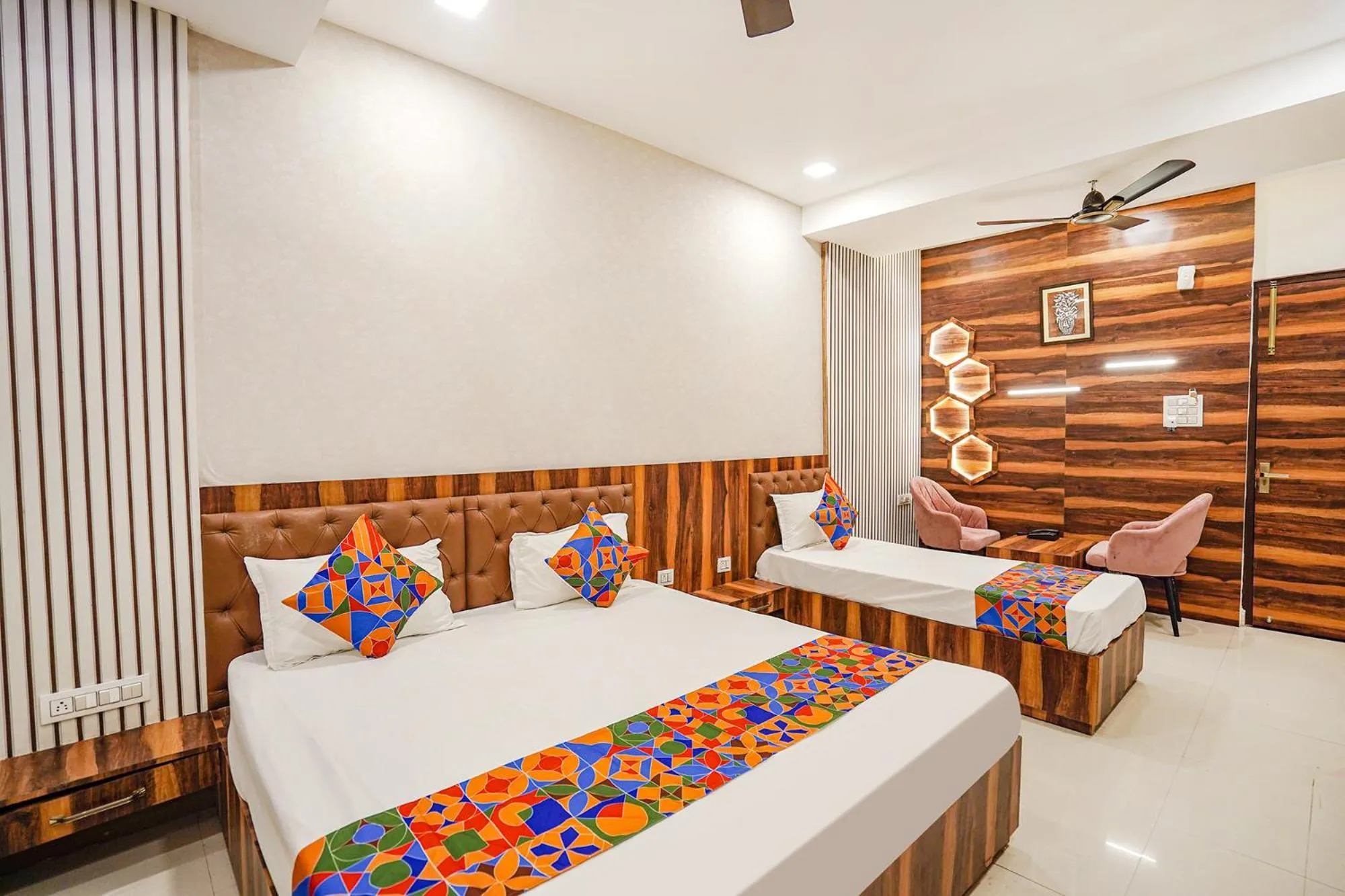 Bed in FabHotel TS Inn