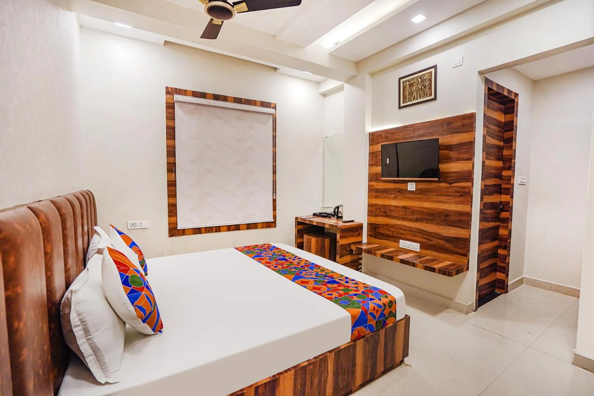 Bed in FabHotel TS Inn