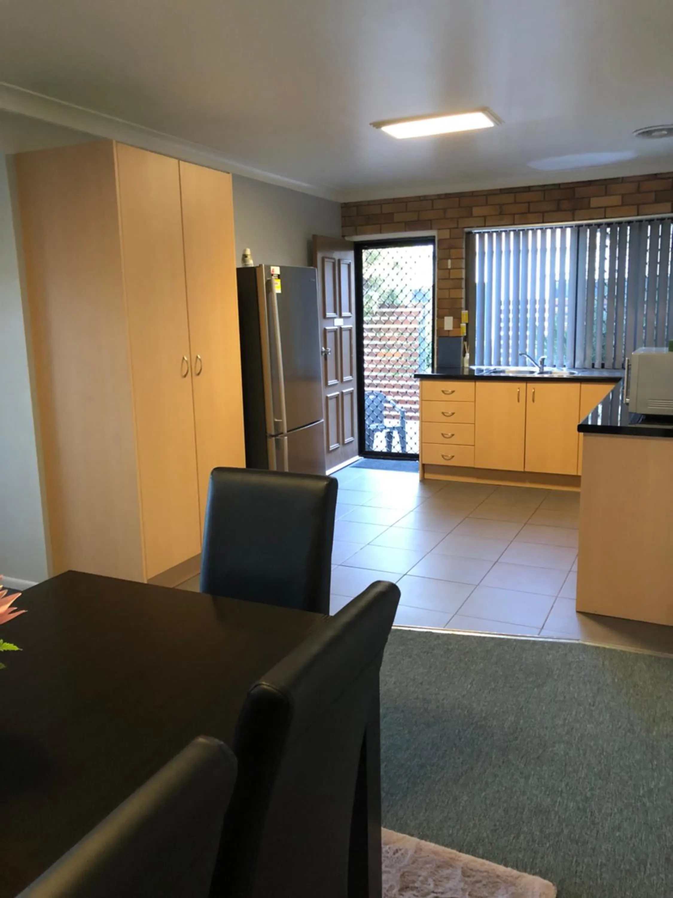 Kitchen or kitchenette in Jackie Howe Motel