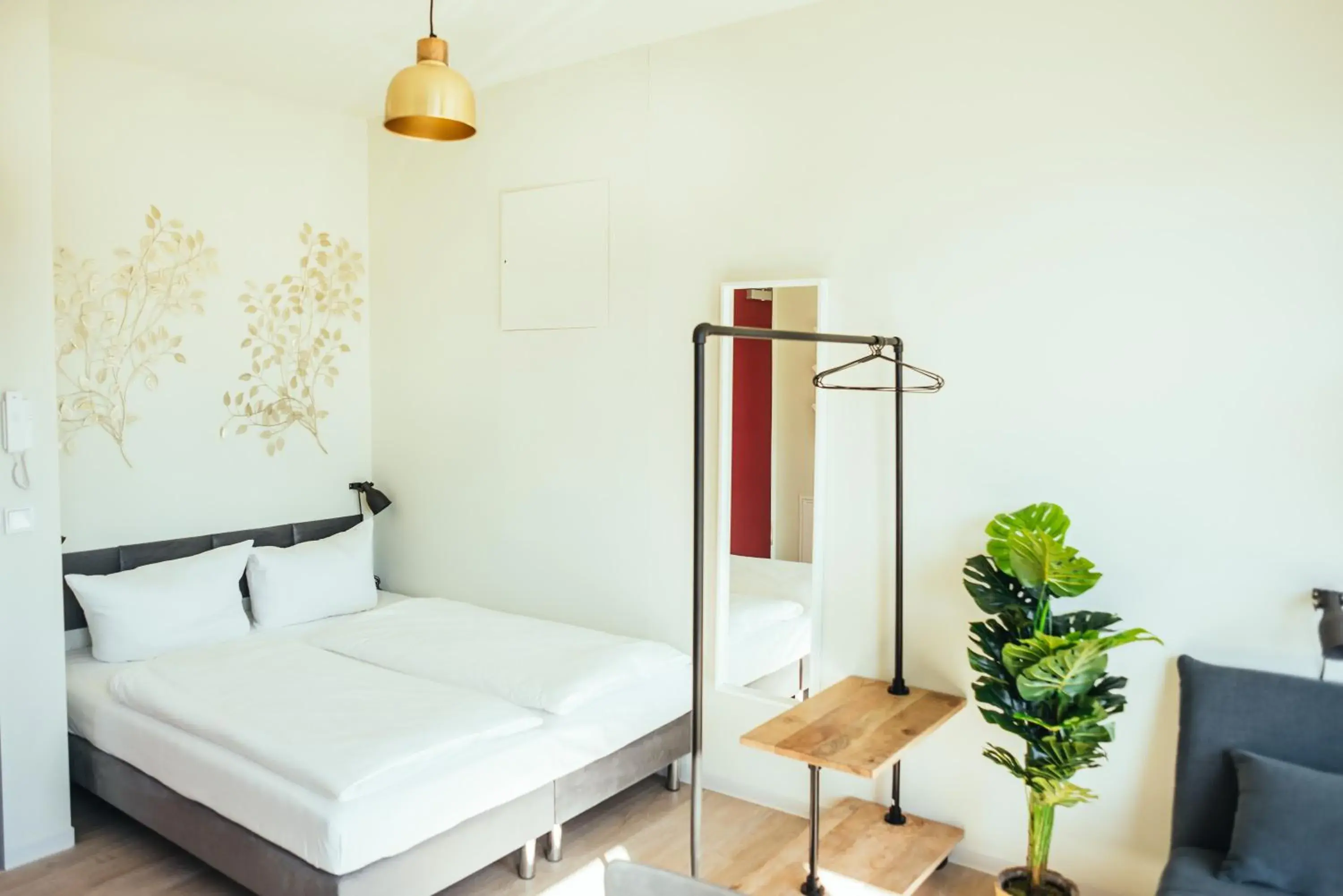 Bed in The Rix Studios & Suites Bed in The Rix Studios & Suites